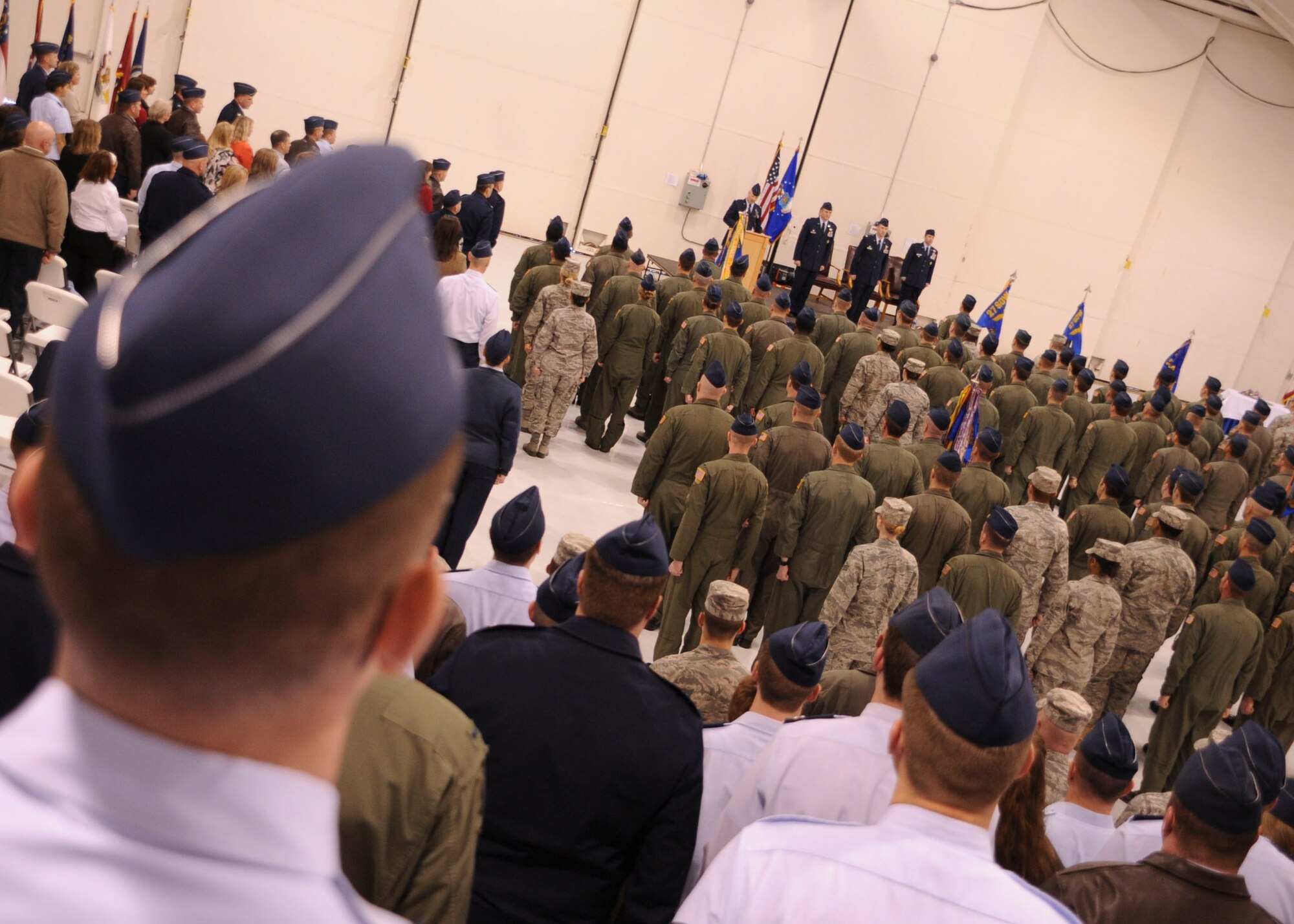 Members of the 27th Special Operations Wing gathered in hangar 194 for the 27th Special Operations Group change of command, Cannon Air Force Base, N.M., March 8. The change of command is a military formation rooted in history and tradition and dates back to the 18th century reign of King Frederick the Great of Prussia. (U.S. Air Force photo/Senior Airman Erik Cardenas)