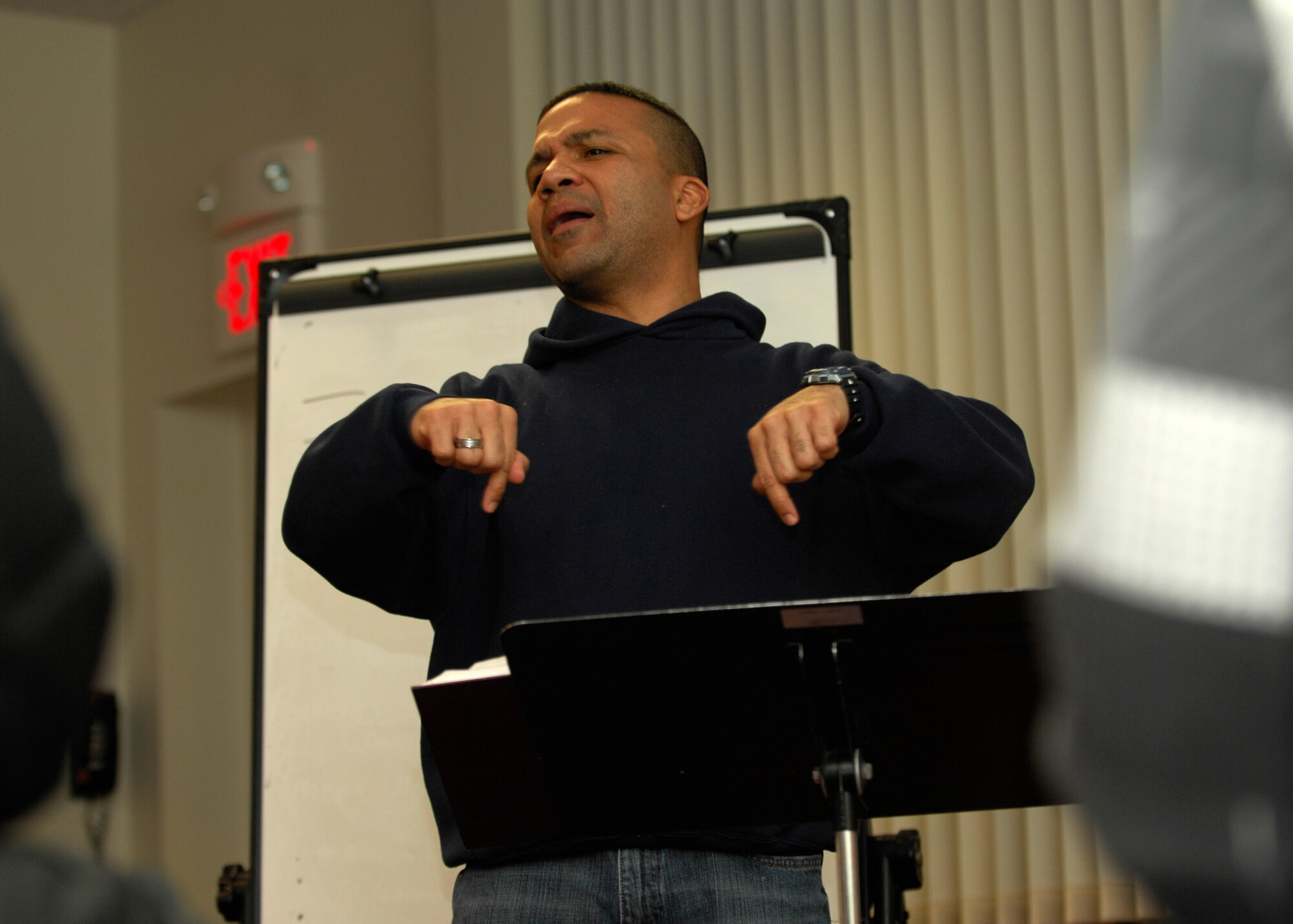 MINOT AIR FORCE BASE, N.D. -- Capt. Eddie Rubero, 5th Bomb Wing Protestant chaplain, speaks about having a growing relationship with the Lord during a Spanish Bible study session at Northern Lights Chapel on base March 7. Captain Rubero leads the Spanish Bible study every Sunday evening at 7p.m. (U.S. Air Force photo by Airman 1st Class Ashley N. Avecilla)