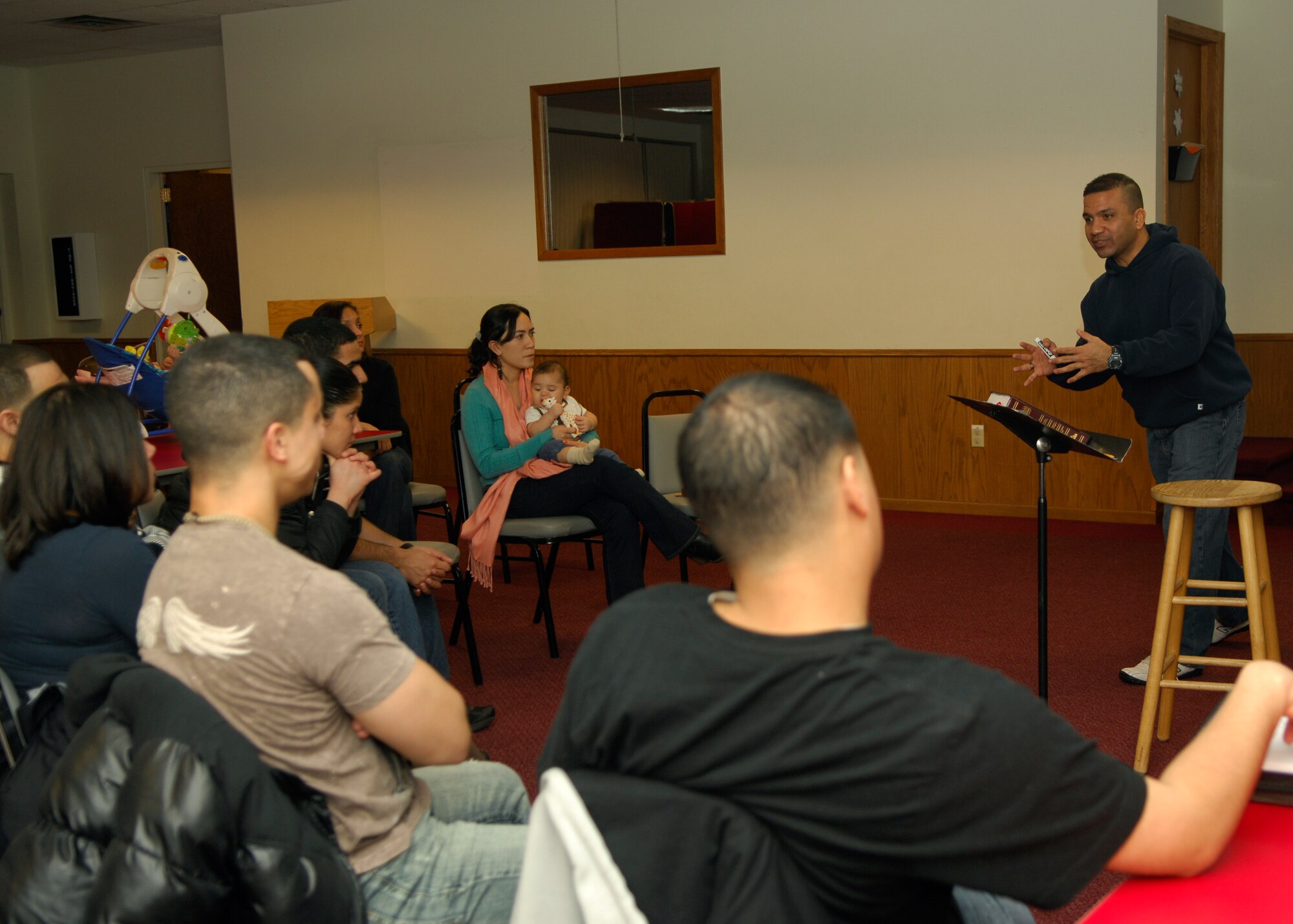 MINOT AIR FORCE BASE, N.D. – Capt. Eddie Rubero, 5th Bomb Wing Protestant chaplain, leads the Sunday evening Spanish Bible study at Northern Lights Chapel on base March 7. The Bible study touches on topics ranging from prayer to spiritual warfare. (U.S. Air Force photo by Airman 1st Class Ashley N. Avecilla)
