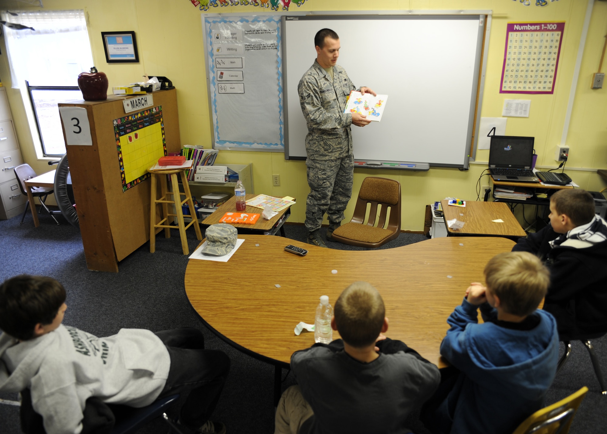 Airman 1st Class Nick Kordenbrock reads to a group of students March 2 at Oakbrook Elementary School in Ladson for Read Across America Week. The nationwide Read Across America Week celebration takes place each year on or around March 2, the birthday of children's author Dr. Seuss. Airman Kordenbrock is an analysis journeyman with the 437th Maintenance Operations Squadron. (U.S. Air Force photo/Senior Airman Katie Gieratz)