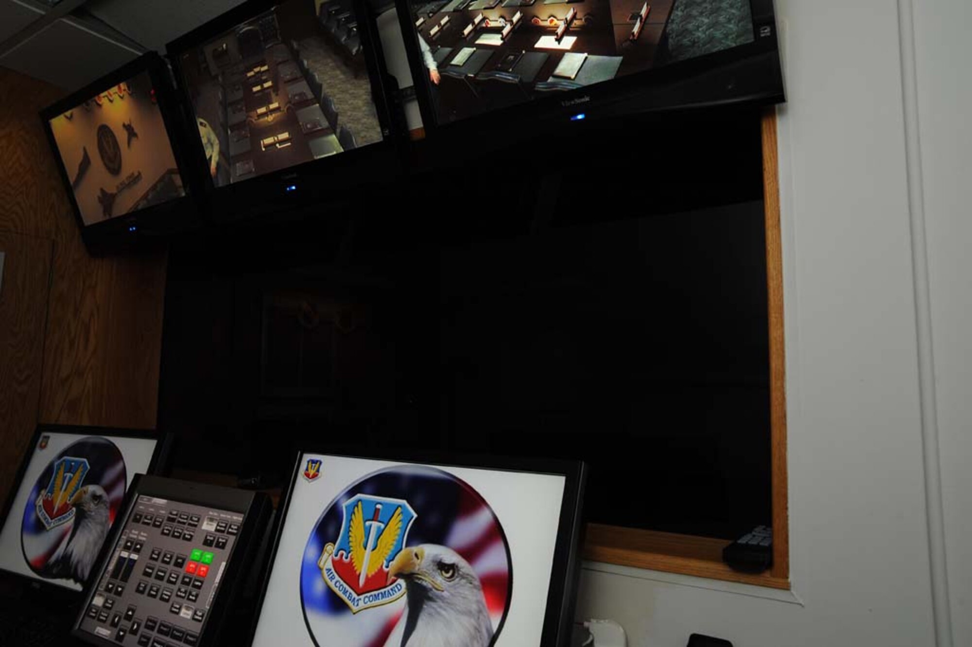 LANGLEY AIR FORCE BASE, Va. -- The conference room for the commander of the Air Combat Command underwent a major overhaul in recent weeks, to include an additional four monitors in the control center. The monitors give the COMACC the ability to monitor and adjust input and output from three HD projectors and three cameras as needed. (Courtesy photo)