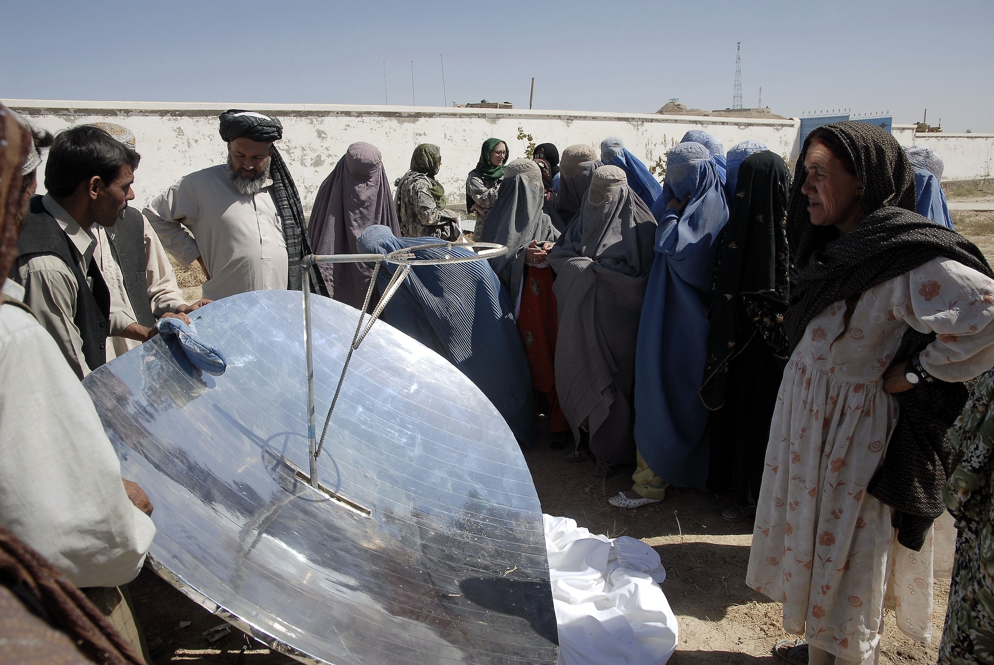 PRT Zabul introduced the solar cooking concept to the community, offering new ideas and technology for food preparation.  Each woman received one of these solar cookers in September 2009. (U.S. Air Force photo by Maj. Elizabeth Erickson/Released)
