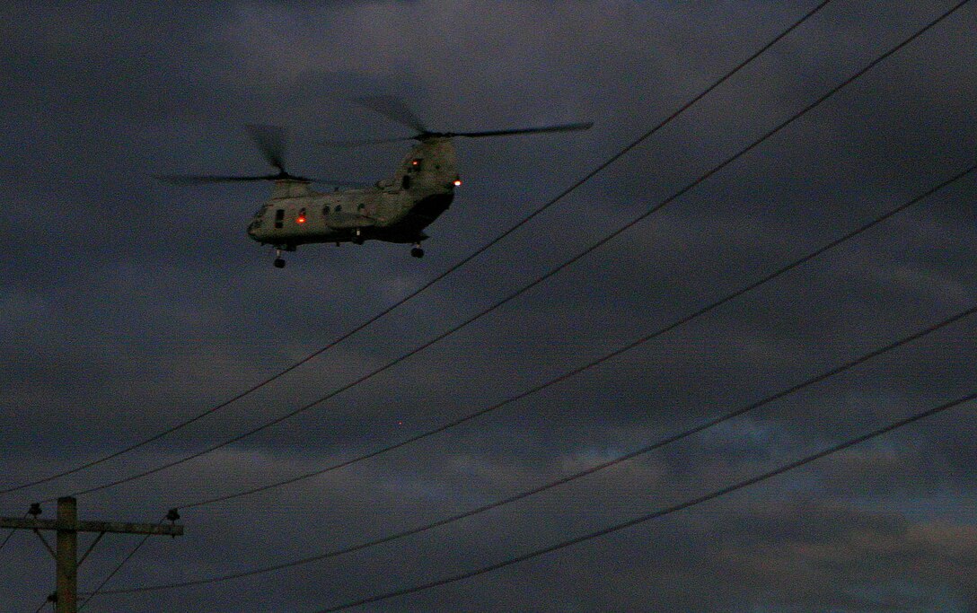 A CH-46E Sea Knight with Marine Medium Helicopter Squadron 265 Reinforced (HMM-265 REIN) approaches a landing zone objective during a mock helicopter raid, March 10. Servicemembers from the Armed Forces of the Philippines (AFP) and the 31st Marine Expeditionary Unit (MEU) are training together during Balikatan 2010 (BK ’10) to hone their civil-military interoperability skills to ensure more responsive, efficient and effective relief efforts.