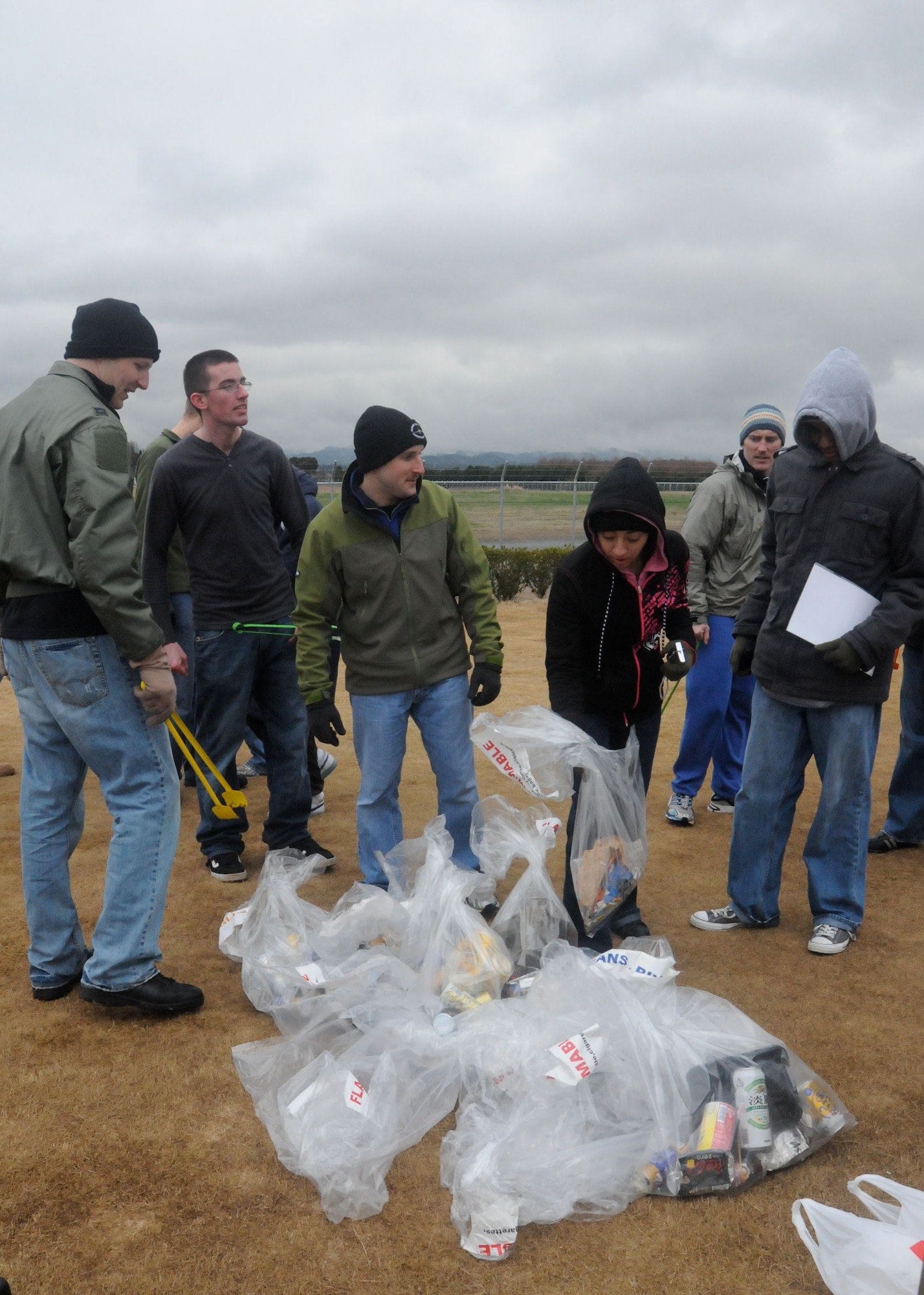 TSUIKI CITY, Japan ? Airmen from Misawa Air Base gather the trash they collected at a park just outside the base March 9, 2010. While at Tsuiki for an aviation training relocation exercise, Airmen participated in the park cleanup to help build good relations and show their appreciation to the local community. (U.S. Air Force photo/Staff Sgt. Rachel Martinez)