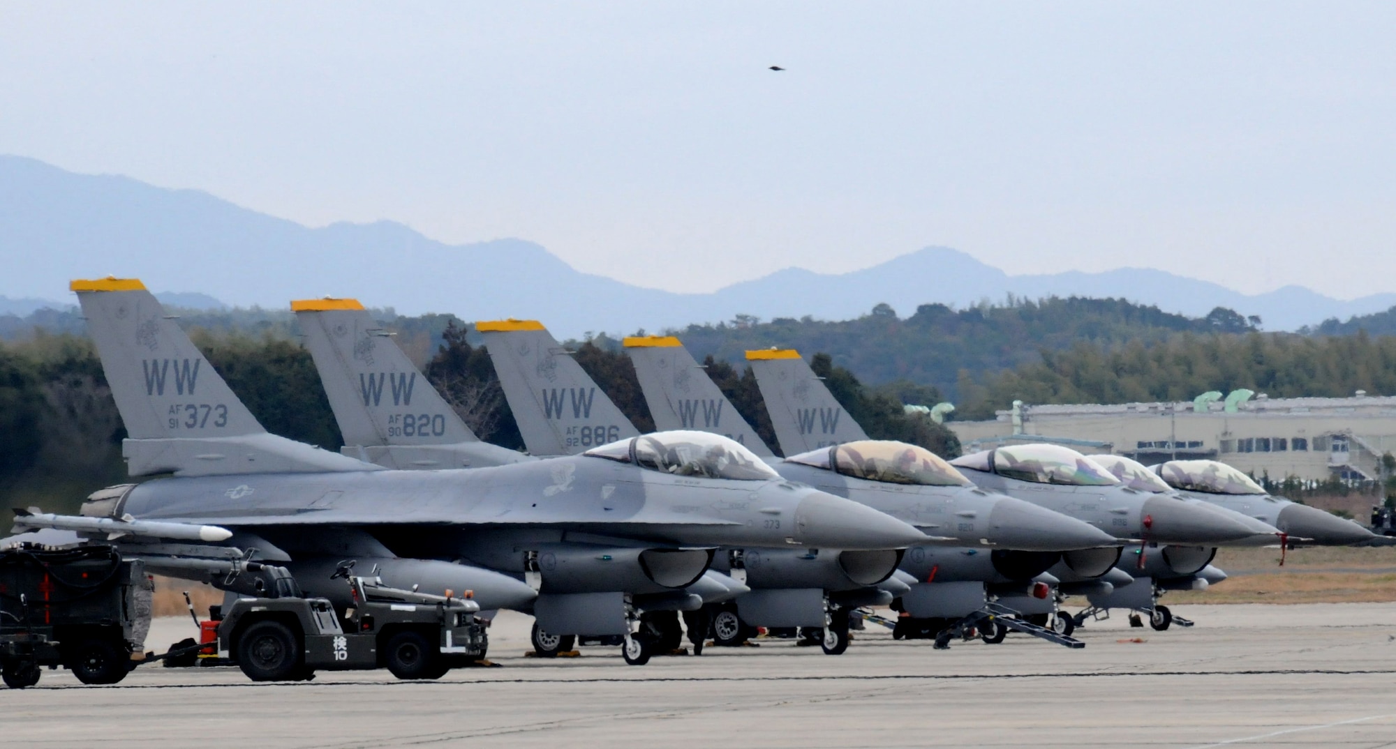 TSUIKI AIR BASE, Japan ? Five F-16 Fighting Falcons are positioned on the flightline March 8. The jets, from Misawa Air Base, are conducting dissimilar air training with Japan Air Self-Defense Force F-2s and F-15s during an aviation training relocation March 8-12. (U.S. Air Force photo/Staff Sgt. Rachel Martinez)