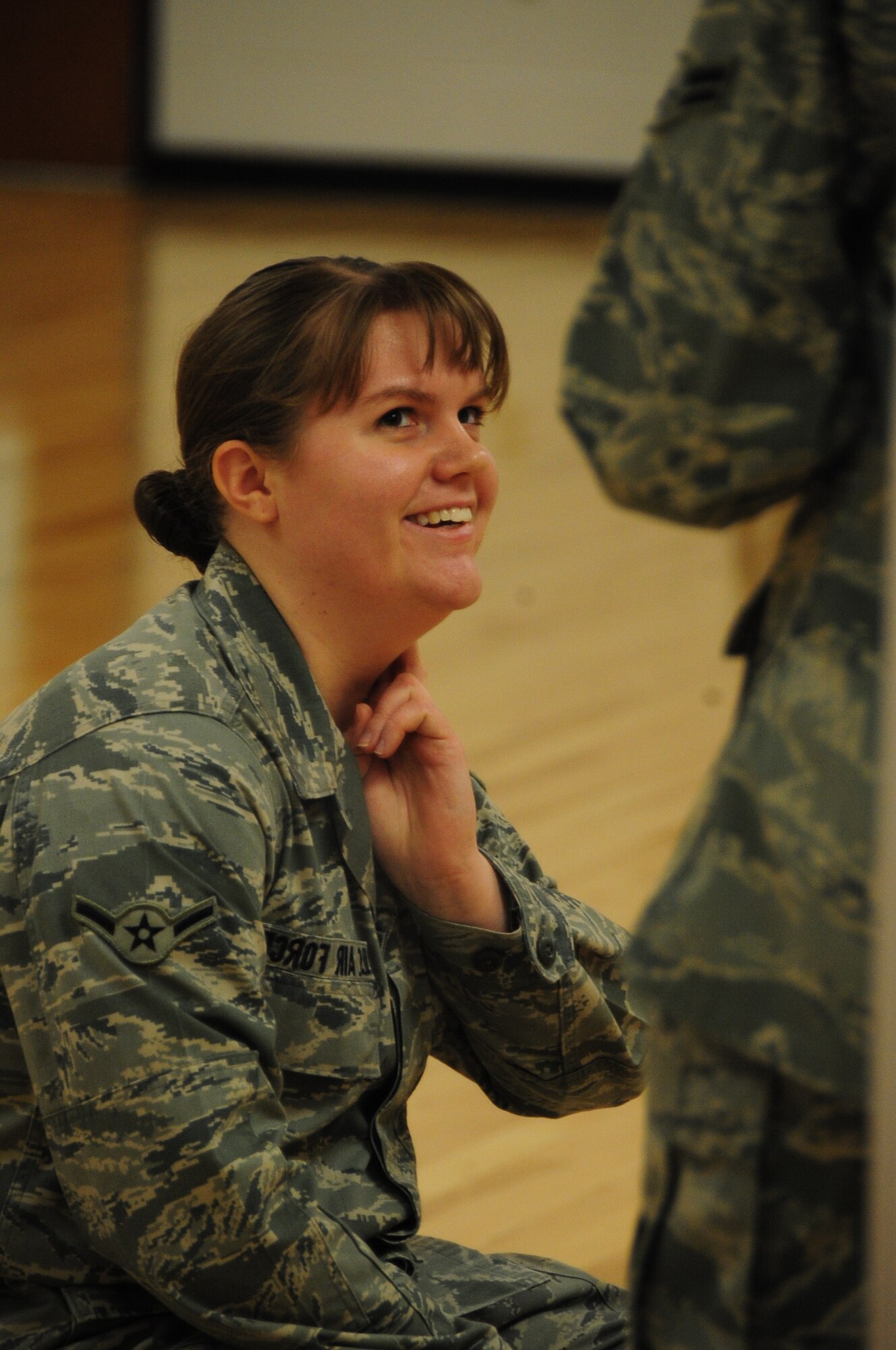 ELLSWORTH AIR FORCE BASE, S.D. -- Airman Kaitlin Walker, 28th Bomb Wing radio and television broadcaster, checks her pulse after a three minute cardio drill during a fitness assessment, March 9.  Airman Walker checked her pulse in order to track her resting heart rate after a cardio workouts. (U.S. Air Force photo/Airman 1st Class Anthony Sanchelli)