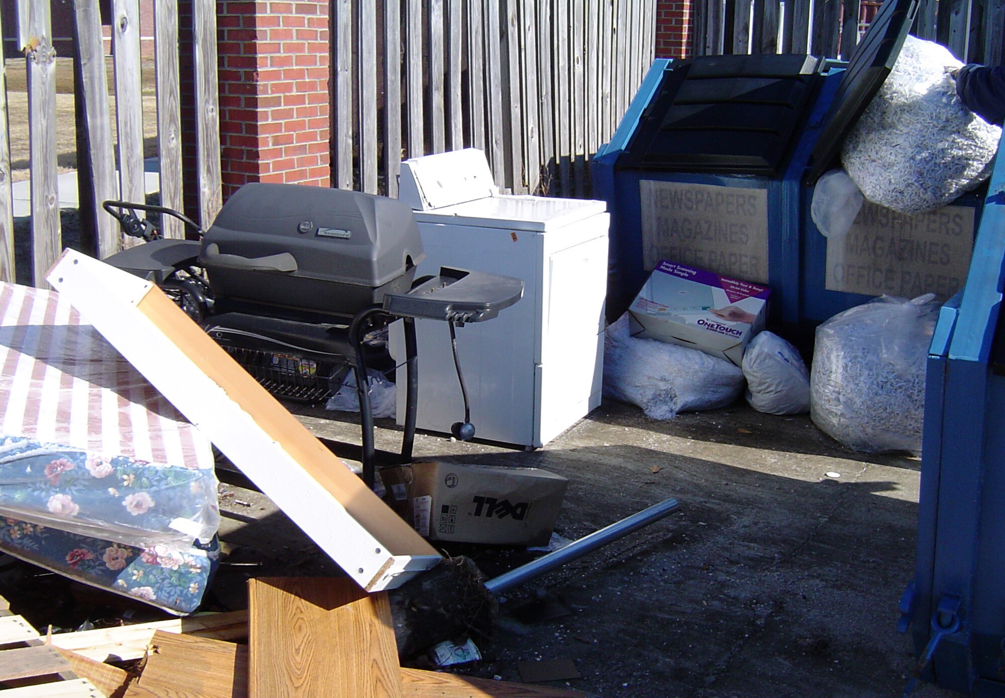 Numerous improperly disposed of household appliances and pieces of furniture were left at the base theater. Unauthorized dumping constitutes a dereliction of duty under the Uniform Code of Military Justice. (Courtesy photo)
