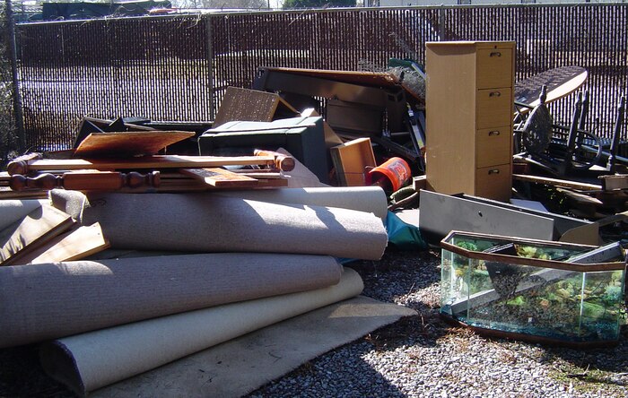 Numerous improperly disposed of household items, including drawers, a fish tank and a bed frame were dumped at the bulk disposal yard recently. Military members and civilians who dump trash on private or public property violate South Carolina Code 16-11-700. (Courtesy photo)
