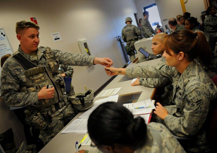 MOODY AIR FORCE BASE, Ga. -- An Airman processes through the deployment processing line during a Phase I Operational Readiness Inspection here March 9. During an ORI, the wing and its personnel are tested on their combat readiness capabilities. (U.S. Air Force photo by Senior Airman Gina Chiaverotti-Paige)