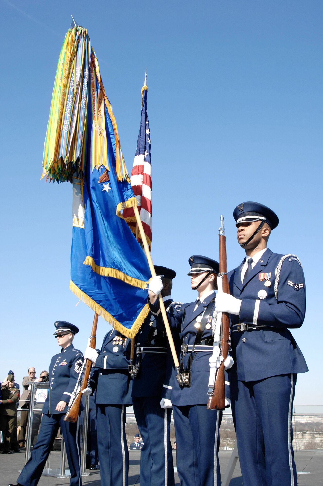 Members of the Air Force Honor Guard post the colors for a Women Airforce Service Pilots ceremony during a wreath-laying ceremony March 9, 2010, in Arlington, Va., to honor the 38 WASP that lost their lives in the line of duty. (U.S. Air Force photo/Senior Master Sgt. Kim Allain)