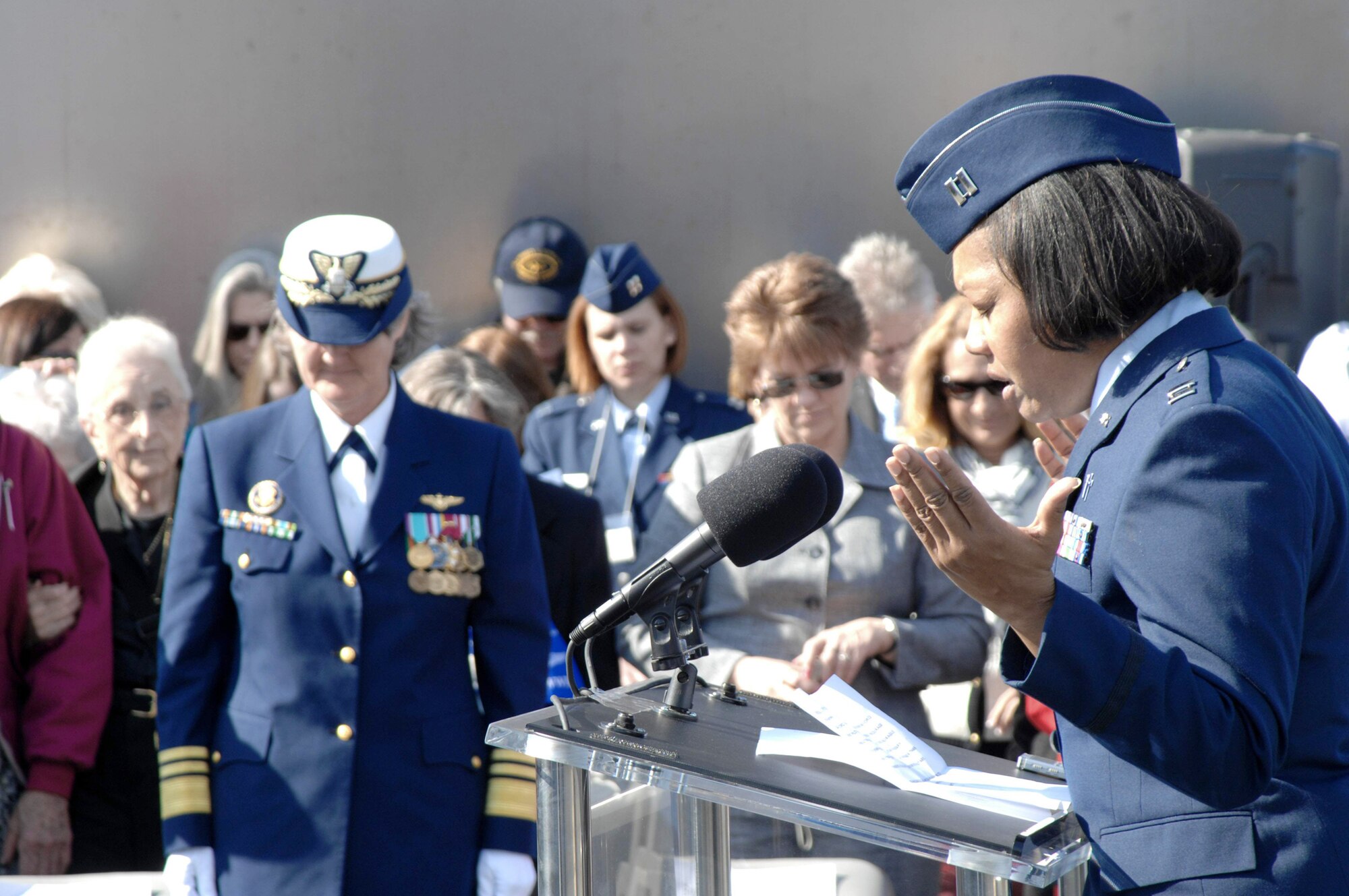 Chaplain (Capt.) Jamie Martin gives the invocation to Women Airforce Service Pilots members and guests at a ceremony March 9, 2010 in Arlington, Va., to honor the 38 WASPs who lost their lives in the line of duty. (U.S. Air Force photo/Senior Master Sgt. Kim Allain)