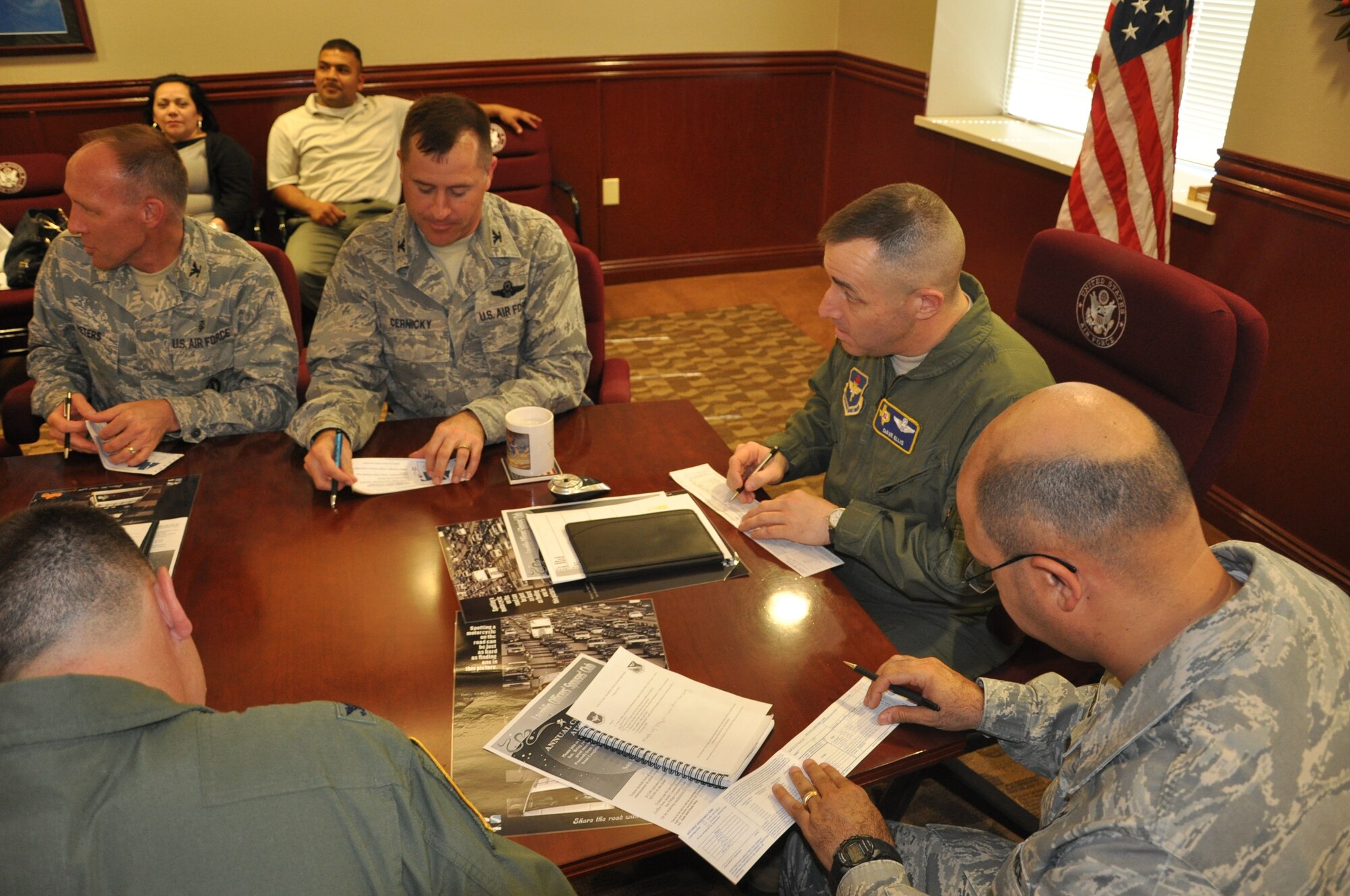 LAUGHLIN AIR FORCE BASE, Texas – Laughlin’s leadership takes a moment to do their part in kicking off the 2010 Air Force Assistance Fund campaign by donating to the cause, which runs from March 8 until April 16. The fund assists Airmen in need in a number of different ways through four foundations. In 2009 Laughlin Airmen received $29,274 for emergency assistance. This year’s goal is to surpass $31,037 in donations in order to help more Airmen across the base. To donate, please contact the installation project officers for the fundraiser, Staff Sgt. Diana Vela at 830-298-4487 or Capt. Mitchell Randolph at 830-298-5170. (U.S. Air Force photo by Airman 1st Class Blake Mize)