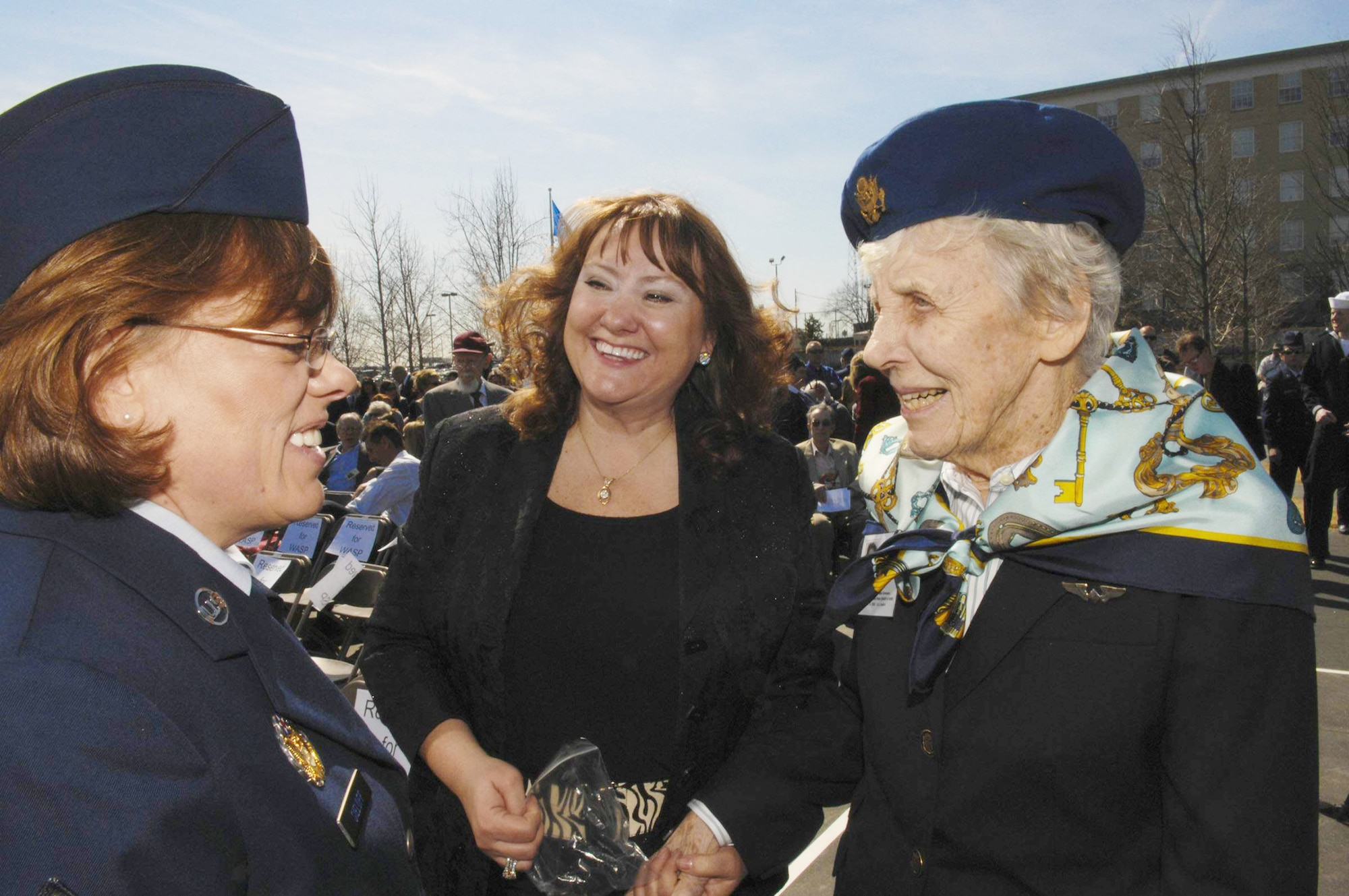 Chief Master Sgt. Beth Sieloff (left) shares a light moment with Women Airforce Service Pilot member Virginia Wise (right) and Ms. Wise's escort, Penny Hunt, before a wreath-laying and remembrance ceremony March 9, 2010, at the Air Force Memorial in Arlington, Va. (U.S. Air Force photo/Staff Sgt. Erica J. Knight)
