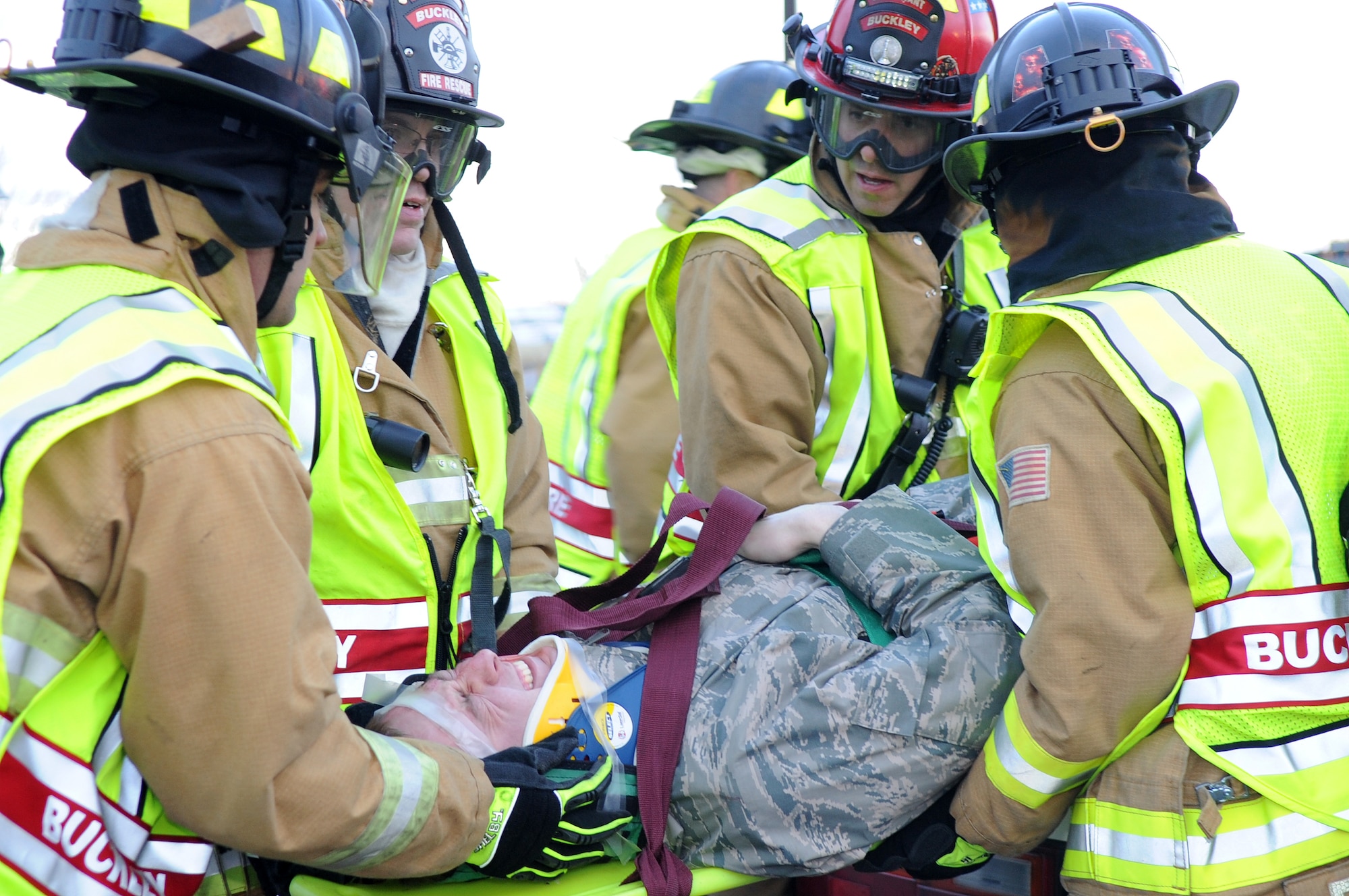 BUCKLEY AIR FORCE BASE, Colo. -- 460th Civil Engineer Squadron firefighters respond to an exercise car accident Feb. 25 as part of the Operational Readiness Inspection. (U.S. Air Force Photo by Airman First Class Marcy Glass)
