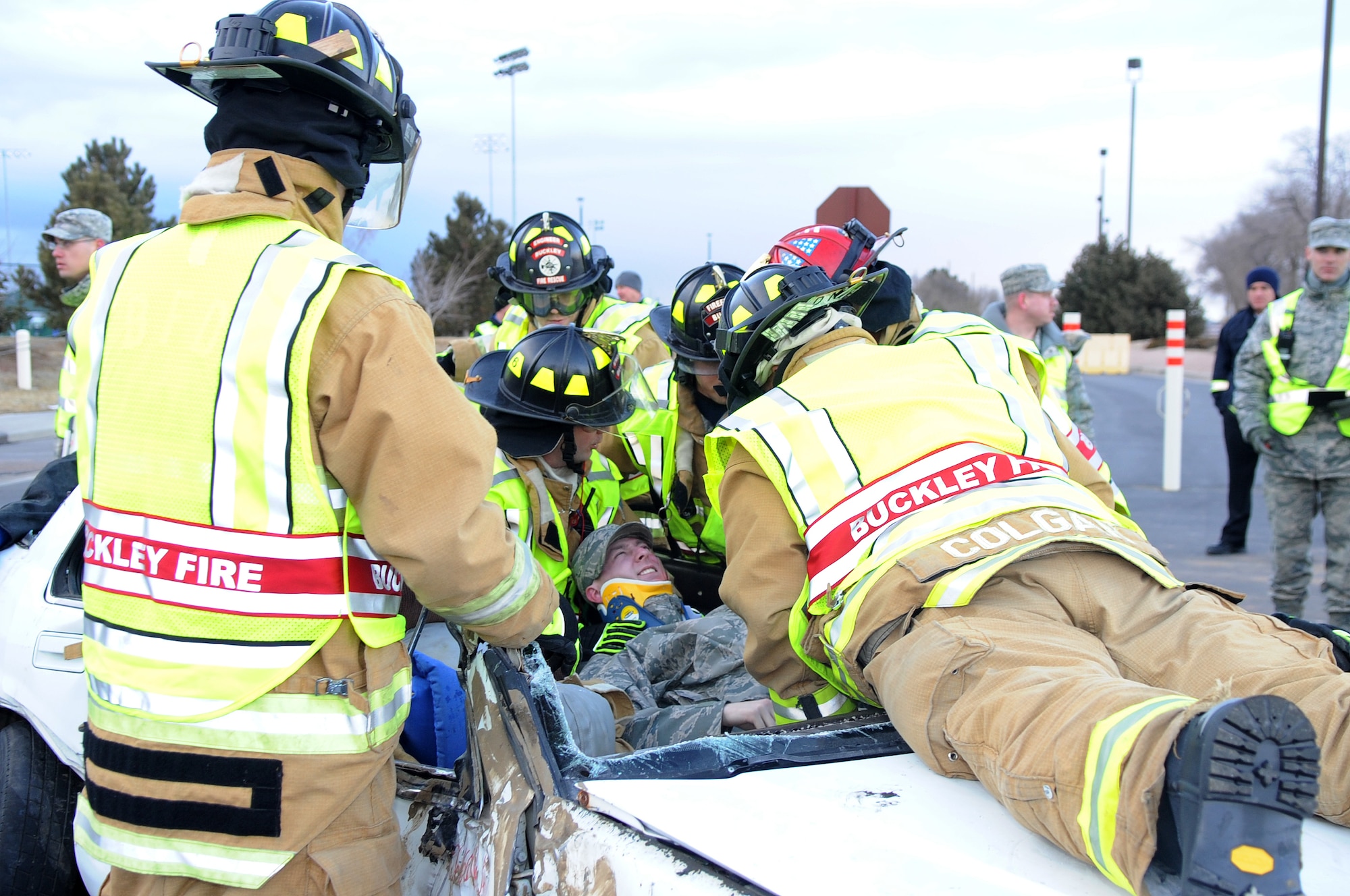 BUCKLEY AIR FORCE BASE, Colo. -- 460th Civil Engineer Squadron firefighters respond to an exercise car accident Feb. 25 as part of the Operational Readiness Inspection. (U.S. Air Force Photo by Airman First Class Marcy Glass)