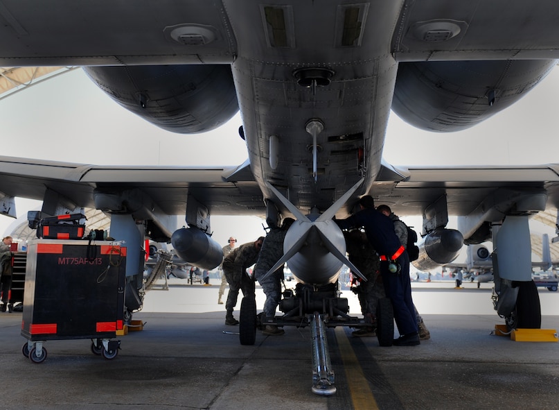 MOODY AIR FORCE BASE, Ga. -- Maintenance Airmen finish loading an external fuel tank on to an A-10C Thunderbolt II during a Phase I Operational Readiness Inspection here March 8. (U.S. Air Force photo by Senior Airman Gina Chiaverotti-Paige)