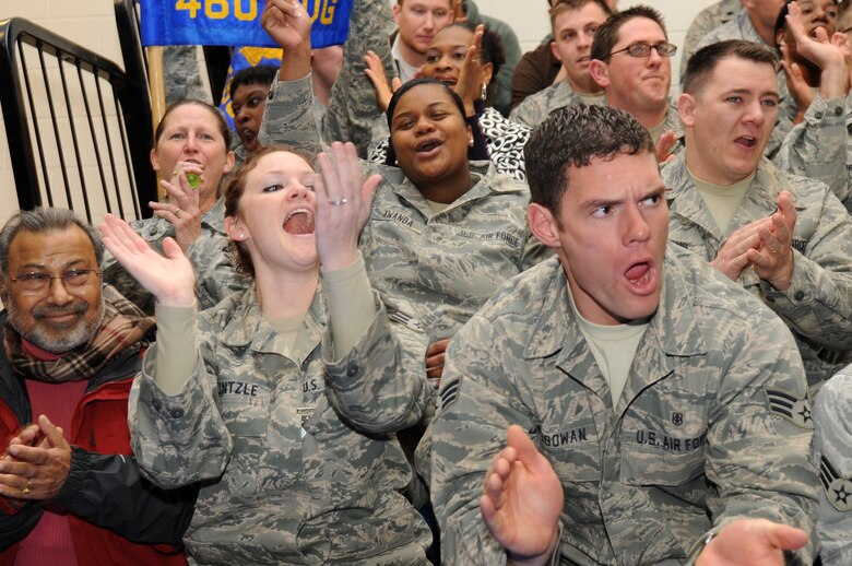 BUCKLEY AIR FORCE BASE, Colo. -- 460th Medical Group Airmen cheer after hearing their performance review during the Operational Readiness / Unit Compliance Inspection outbrief March 10. Team Buckley passed the no-notice ORI/UCI with a satisfactory rating. ( U.S. Air Force Photo by Airman 1st Class Marcy Glass )





