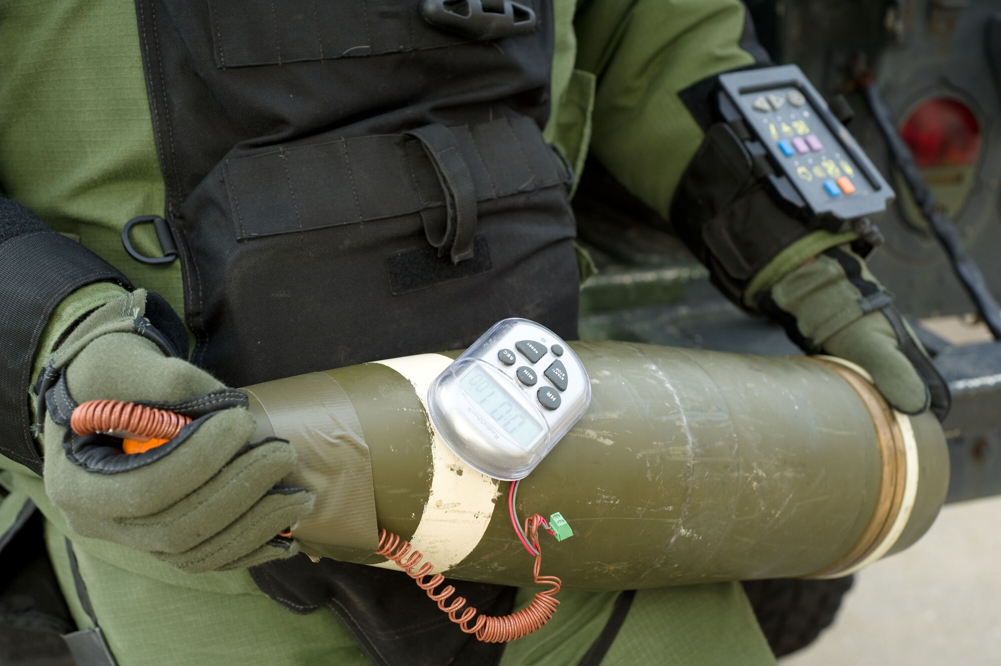 LANGLEY AIR FORCE BASE, Va. – Staff Sgt. Blake Lundstrom, 633d Civil Engineer Squadron Explosive Ordnance Disposal team lead, holds an improvised explosive device training aid March 10.  EOD provides freedom of movement to ground forces and protection for personnel and property, by disposing of explosive hazards.  (U.S. Air Force photo/Staff Sgt. Barry Loo)