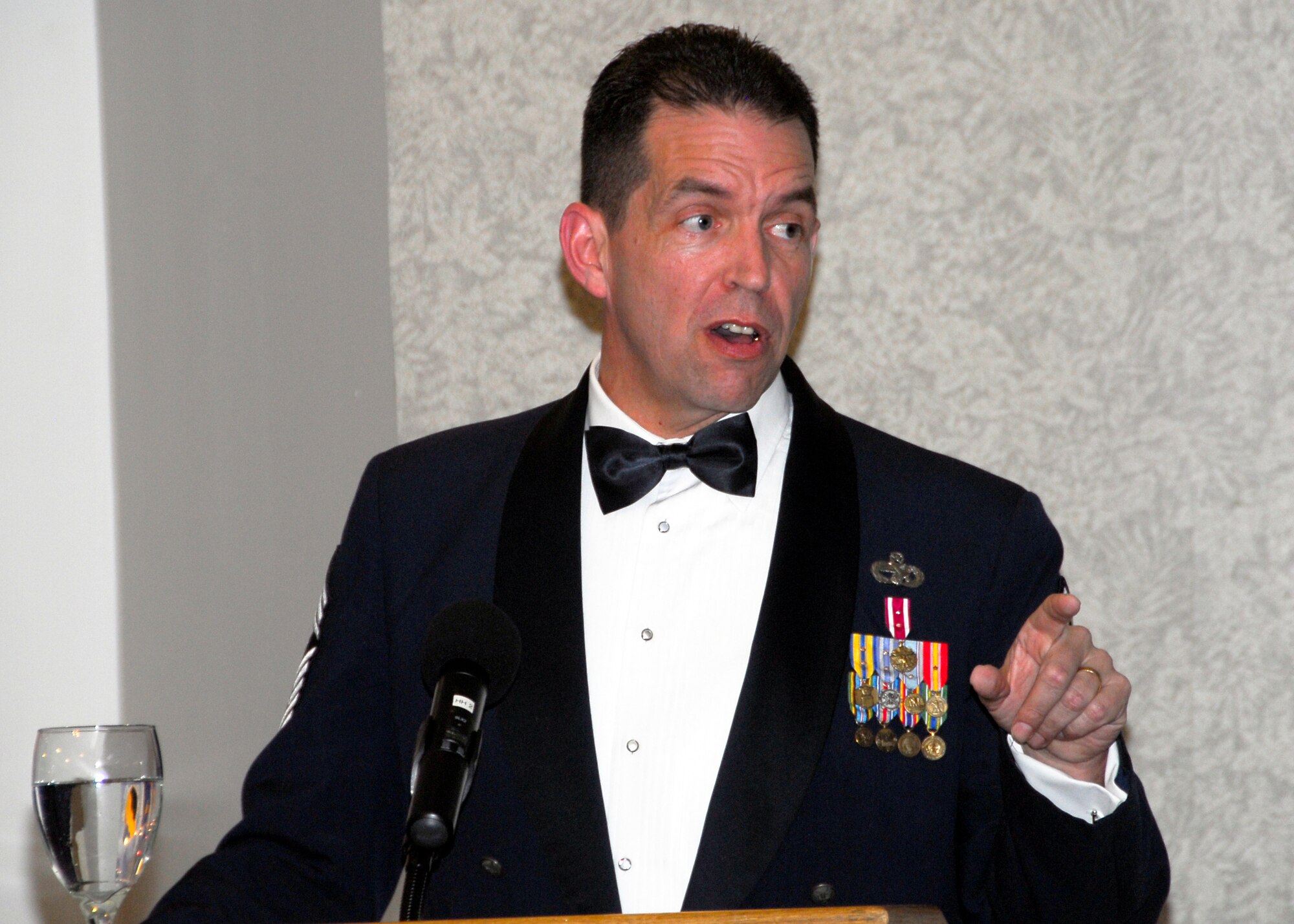 Command Chief of Air Education and Training Command, Chief Master Sgt. Robert Tappana speaks to the award winners and nominees about the factors of excellence during the 2009 82nd Training Wing Annual Awards banquet at the Sheppard Club March 5. (U.S. Air Force photo/Harry Tonemah)