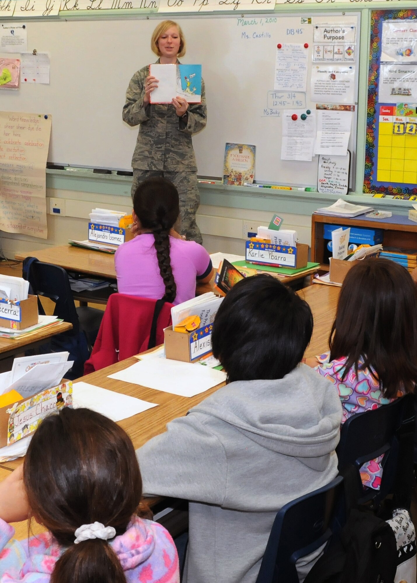Capt. Dawn Cecil reads to a class of students during the Read Across America event at Lomita’s Eshelman Avenue Elementary School, March 2.  Approximately 10 LAAFB personnel read to the students.  Held every year in honor of Dr. Seuss’ birthday, Read Across America events promote children’s literacy.  (Photo by Jim Gordon)