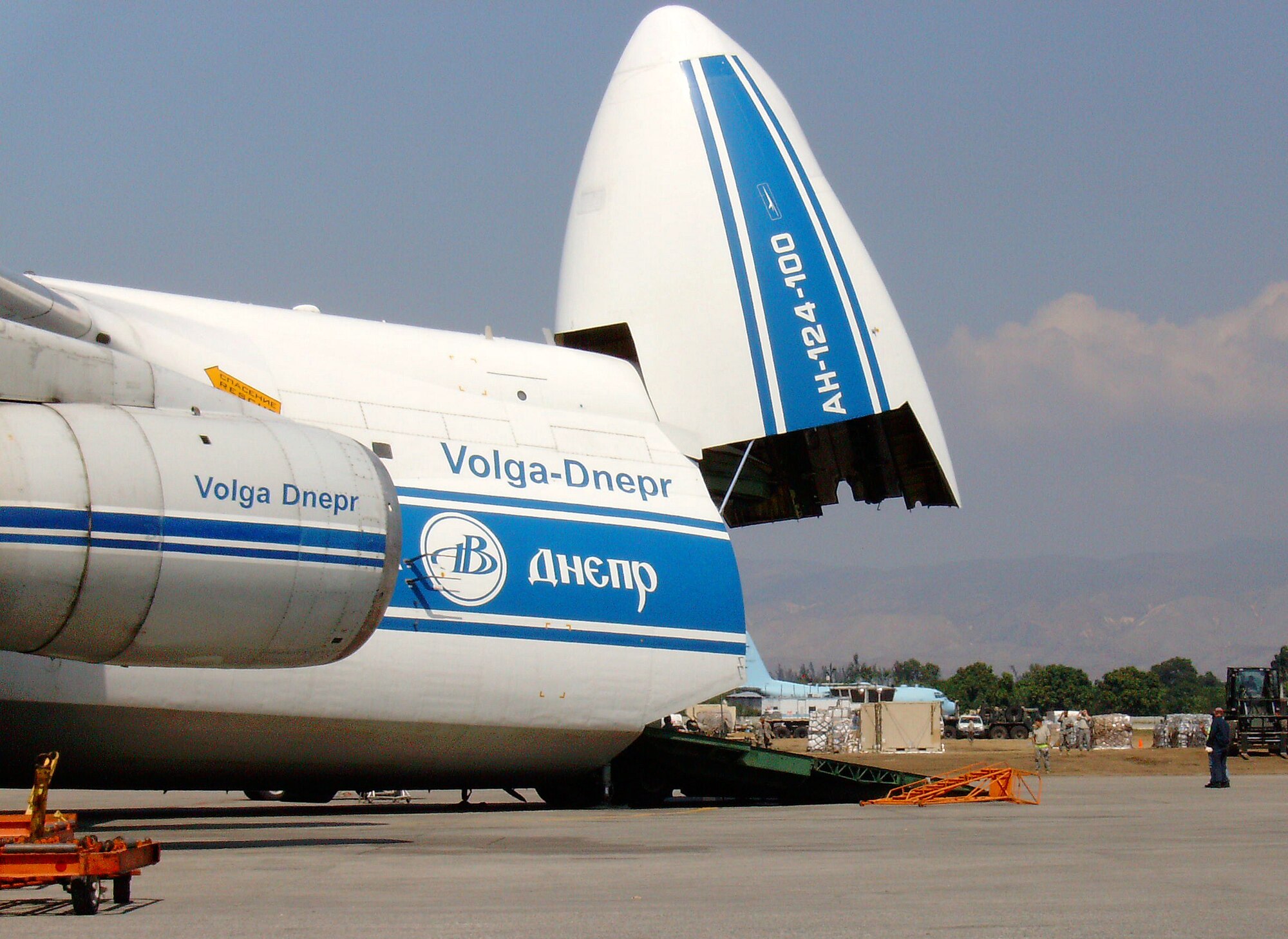 A Volga-Dnepr Airlines Antonov An-124-100 cargo aircraft unloads relief supplies at the Port au Prince airport shortly after the Jan. 12 earthquake that devastated Haiti. Tech. Sgt. Kyle Boles, a flight safety NCO at Vance AFB, was deployed to Haiti to help with the relief supplies airlift. (U.S. Air Force photo/ Tech. Sgt. Kyle Boles)