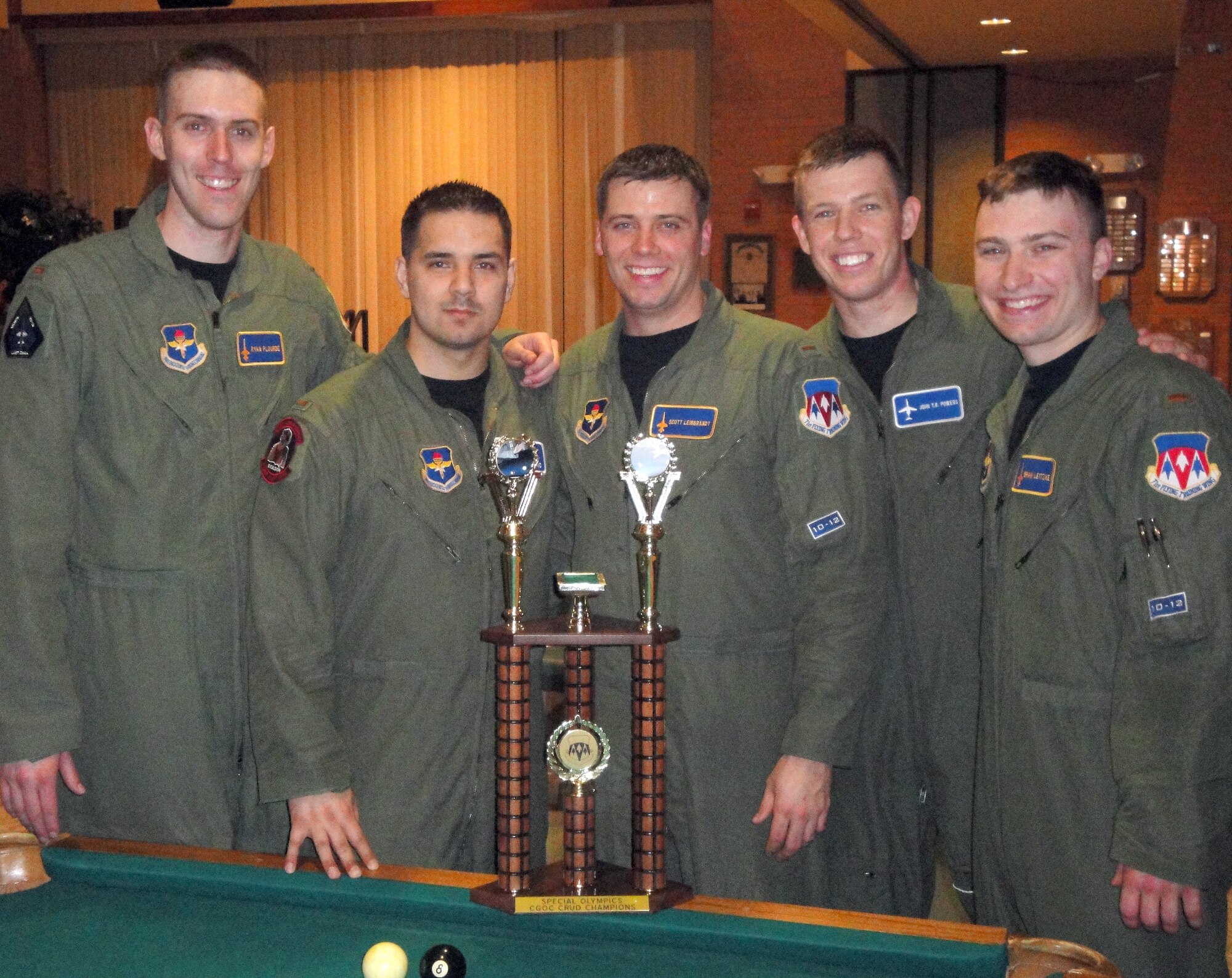 Team "Baby Class 10-12" won their second Crud tournament at the Vance Company Grade Officers’ Council hosted Wing Crud Tournament Friday, March 5, at the Collocated Club. Twenty-three games were played by 12 teams during double-elimination play. More than 200 attended the tournament, which raised funds in support of Special Olympics. Pictured from left are 2nd Lts. Ryan “Stretch” Plourde, Matt “Vegas” Bolado, Scott “Tractor” Leibbrandt, John “Montana” Powers and Brian “Lettuce” Leitzke. Not in photo is team member 2nd Lt. Dan “Bad Rep” Repko. (U.S. Air Force photo/ Capt. Jamie Kaauamo)