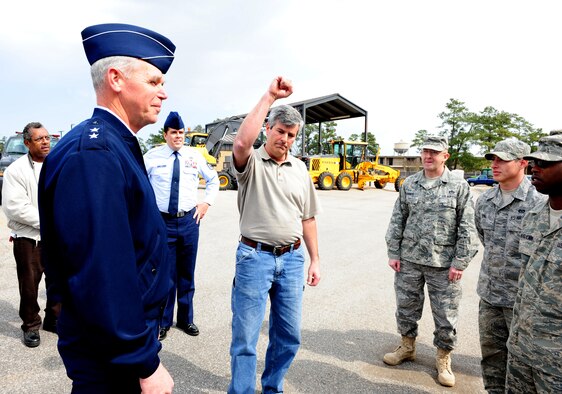 SHAW AIR FORCE BASE, S.C. -- Maj. Gen. William Holland, Ninth Air Force commander, is greeted by Don Kendrick, heavy equipment superintendent, and other members of the 20th Civil Engineer Squadron, March 8. General Holland and his wife, Norma, made an official visit to the 20th Fighter Wing. (U.S. Air Force photo/Airman 1st Class Neil D. Warner)