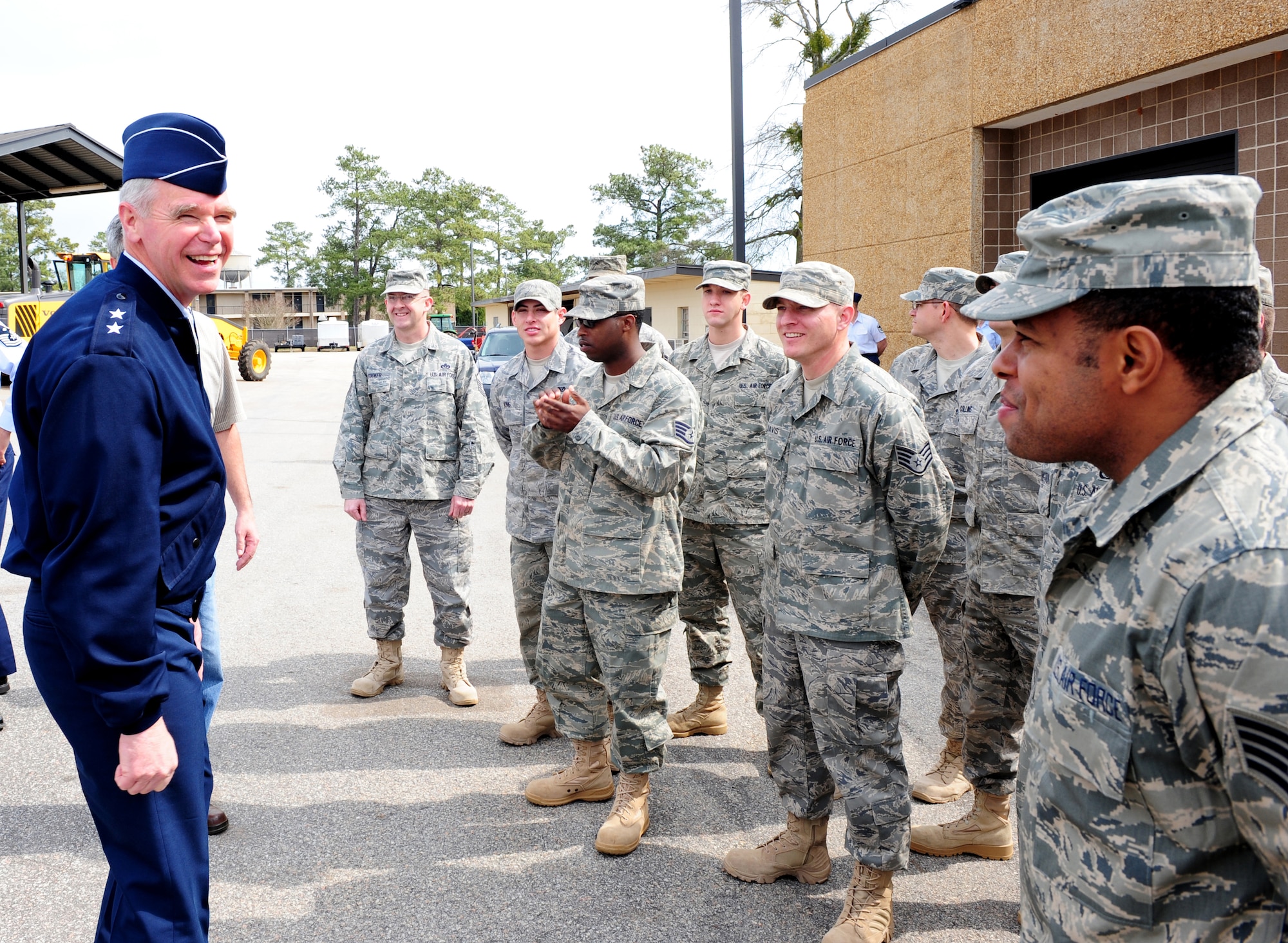 SHAW AIR FORCE BASE, S.C. -- Major Gen. William Holland, Ninth Air Force commander, shares some laughs with Airmen of the 20th Civil Engineer Squadron March 8. General Holland and his wife Norma were making an official visit to the 20th Fighter Wing. (U.S. Air Force photo/Airman 1st Class Neil D. Warner)