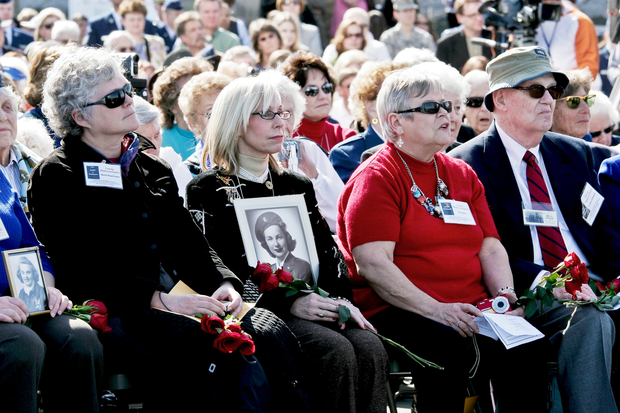 Cheryl Marie Michell Van Riper holds the photo of her aunt, Marie Mitchell, a deceased pilot who flew with the Women Airforce Service Pilots during World War II during a wreath-laying and remembrance ceremony for all 1,102 pilots March 9, 2010, at the Air Force Memorial in Arlington, Va. The ceremony was part of a two-day event in which all pilots will receive the Congressional Gold Medal at the U.S. Capitol for their service. (Defense Department photo/Linda Hosek)
