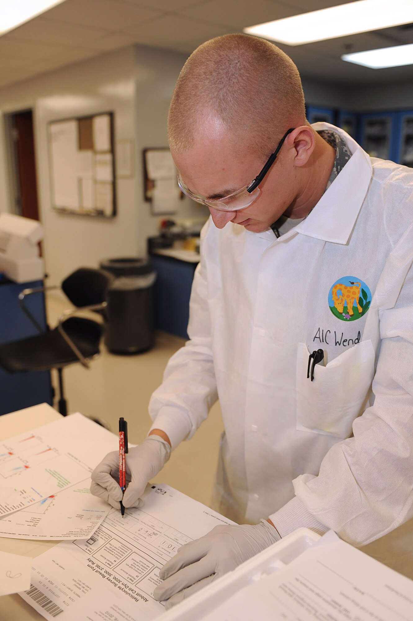 Airman 1st Class Grant Wendland, 19th Medical Group medical technician, completes a College of American Pathologists Survey Data sheet Feb. 3. The survey allows laboratories to regularly evaluate their performance and improve the accuracy of patient results.  (U.S. Air Force photo by Staff Sgt. Chad Chisholm)