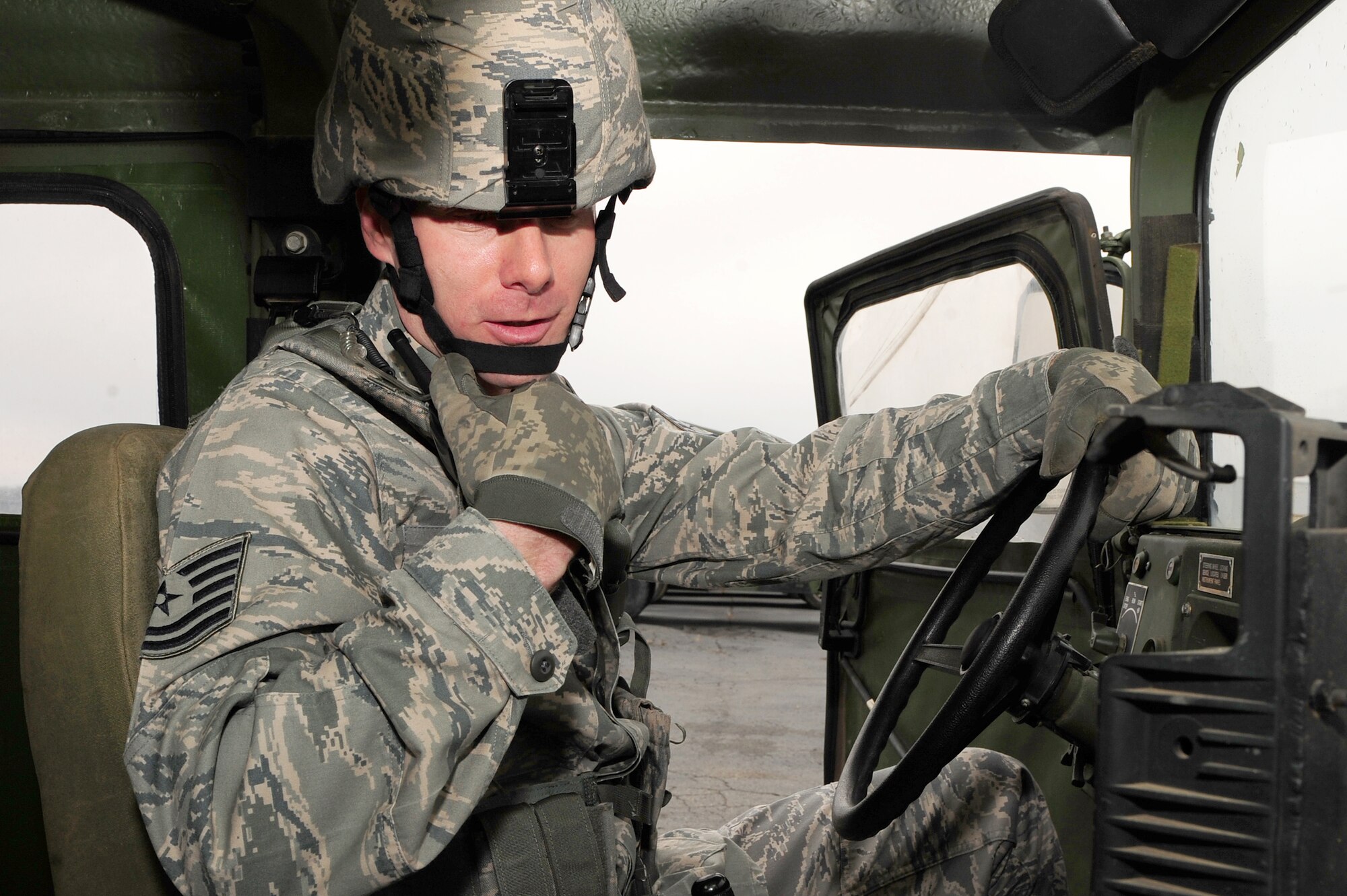 Tech. Sgt. Jeff Bundy, 34th Combat Training Squadron NCO-in-charge of unit readiness, radios an exercise input March 9 during training on base. Sergeant Bundy is vital to the 34th CTS where he’s also a lead contingency response group trainer and executes 10 Joint Readiness Training Center exercises a year in Fort Polk, La. (U.S. Air Force photo by Senior Airman Steele C. G. Britton)