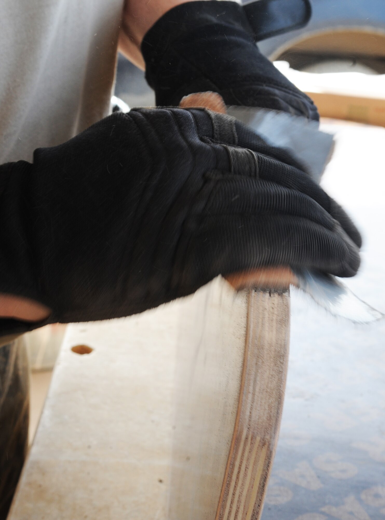 Volunteers from the 506th Expeditionary Civil Engineer Squadron, sand down
pieces of wood during assembly of school desks for local Iraqi children on
March 6, 2010 at Kirkuk Regional Air Base, Iraq.  Out of their goal of 100
desks, 25 of them have already been assembled and are ready to be delivered
to local schools in need. (U.S. Air Force photo/Staff Sgt. Tabitha
Kuykendall/Released)	
