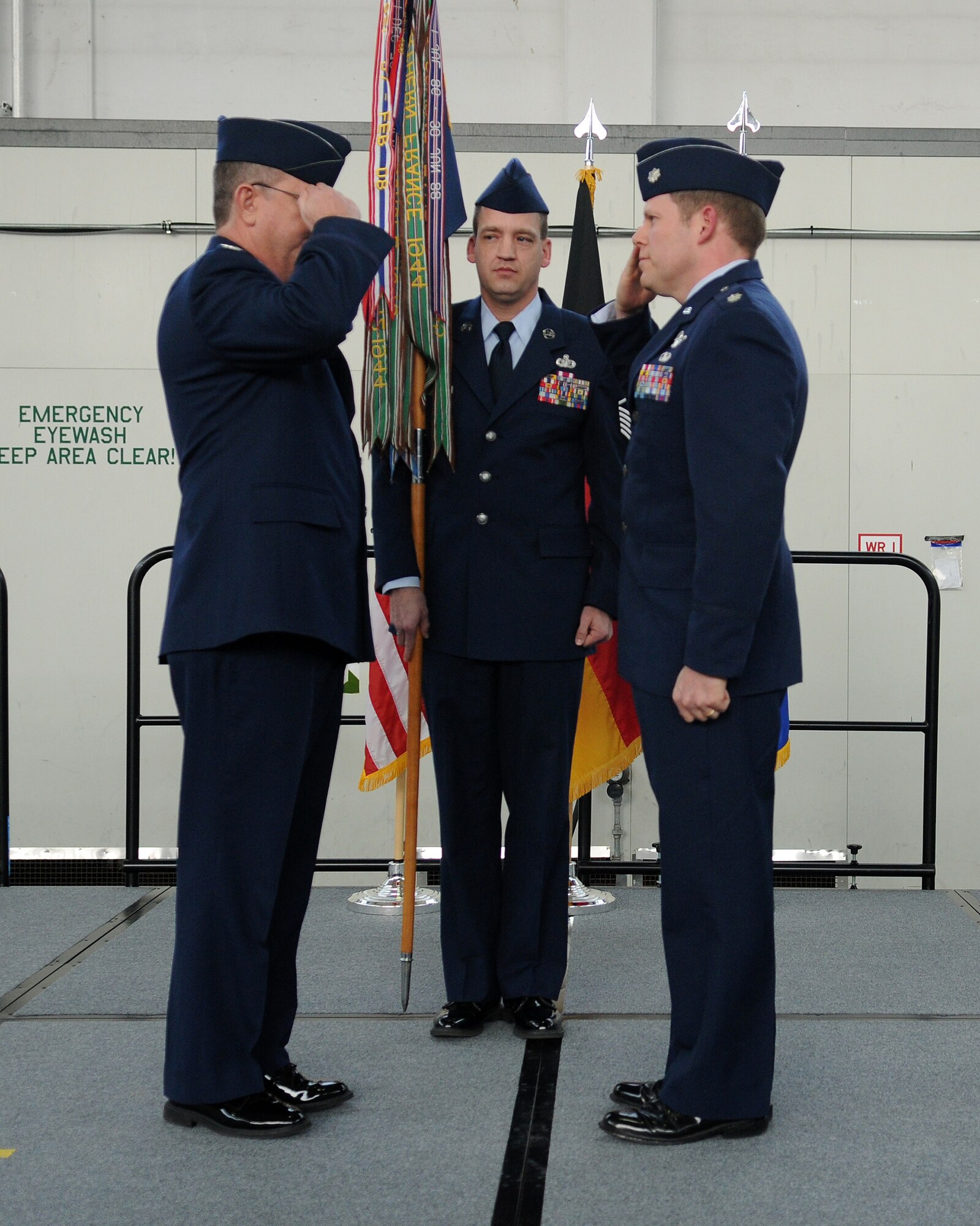 SPANGDAHLEM AIR BASE, Germany – Lt. Col. Andrew Wolcott, 22nd Fighter Squadron commander, receives the 22nd FS guidon from Col. Patrick McCrea, 52nd Operations Group commander, during the 22nd FS change of command ceremony here March 5. (U.S. Air Force photo/Senior Airman Nathanael Callon)