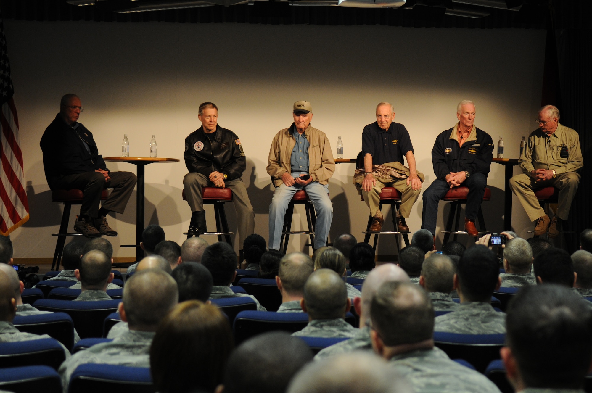 Members from the Legends of Aerospace Tour talk to Airmen at the Kisling Noncommisioned Officer Academy March 5, 2010, Kapaun Air Station, Germany. The American icons (from left to right) David Hartman, original Host of Good Morning America, retired Brig. Gen. Steve Ritchie, Robert Gilliland, Jim Lovell, Apollo 13 commander, Gene Cernan, the last man to walk on the moon, and Neil Armstrong, visited Airmen in U.S. Air Forces in Europe and downrange on their eight-day tour. (U.S. Air Force photo by Airman 1st Class Scott Saldukas)