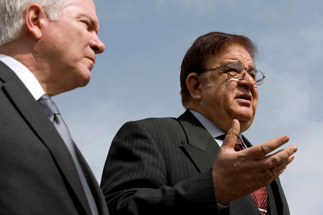 Afghanistan Defense Minister Abdul Rahim Wardak, right, makes brief remarks while U.S. Defense Secretary Robert M. Gates looks on at the Combined Fielding Center on Camp Blackhorse, Afghanistan, March 10, 2010.