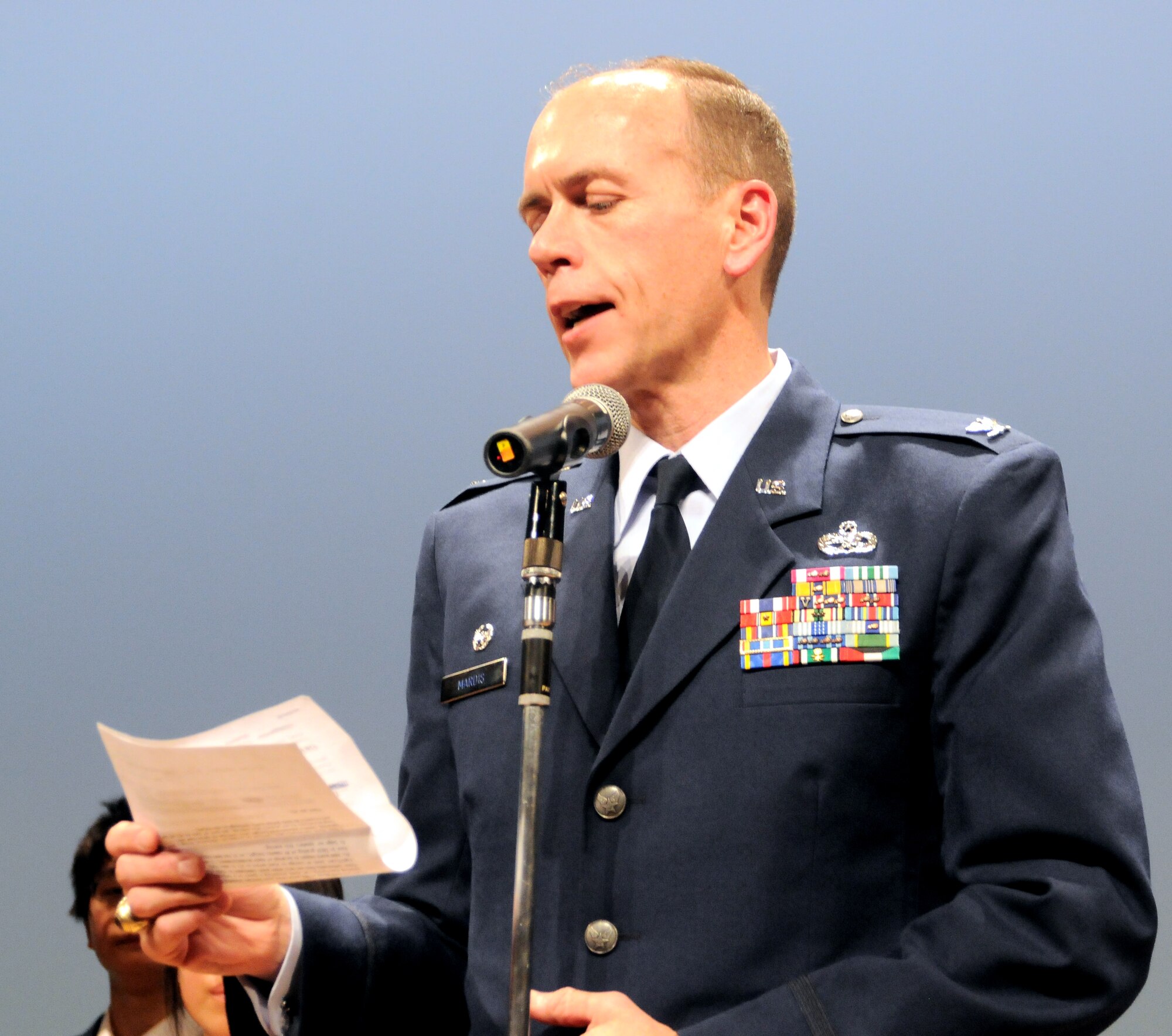 FUSSA, Japan -- Col. Christopher Mardis, 374th Maintenance Group commander, announces the winners of an English speaking contest, March 5. The North Kanto Defense Bureau hosted the Japan-United States Speech Contest to encourage cultural exchange between Japan and the United States. (U.S. Air Force photo/Airman 1st Class Katrina R. Menchaca)