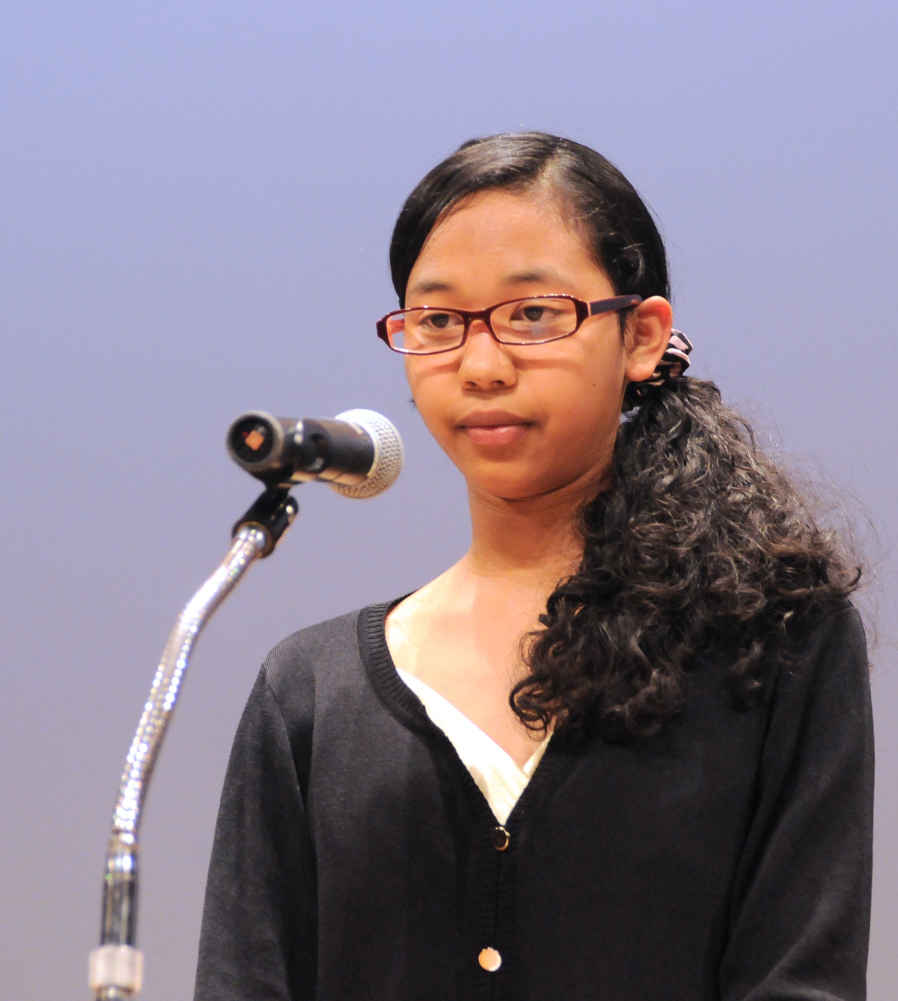 FUSSA, Japan -- A'Shante Henderson, Yokota High School student, gives a speech about her dreams for the future during a contest, March 5. The North Kanto Defense Bureau hosted the Japan-United States Speech Contest to encourage cultural exchange between Japan and the United States. (U.S. Air Force photo/Airman 1st Class Katrina R. Menchaca)
