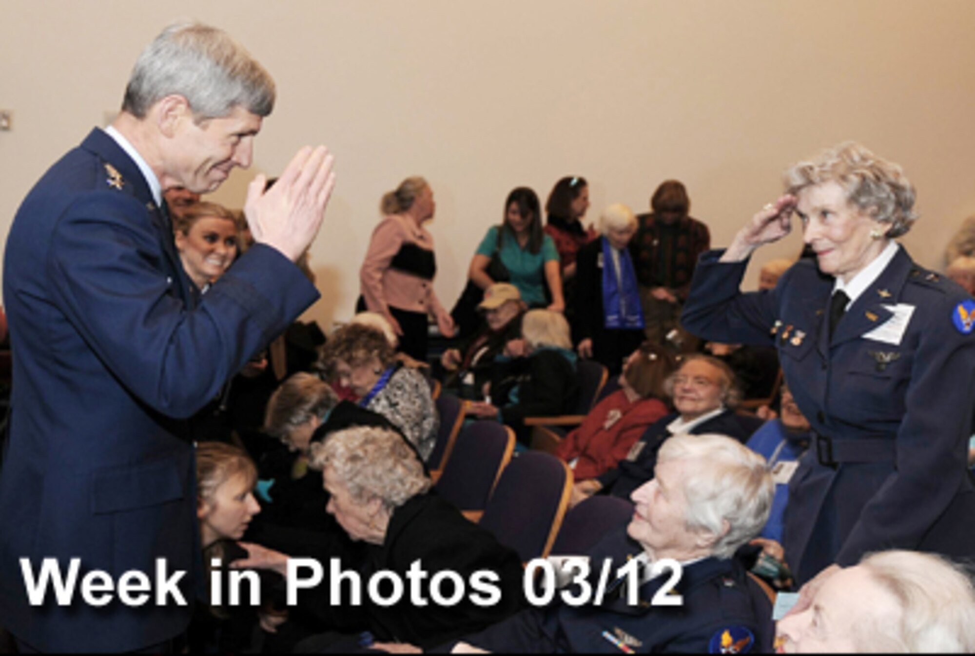 Air Force Week in Photos for March 12, 2010, highlights photos from around the Air Force. In this photo by Andy Morataya, Air Force Chief of Staff Gen. Norton Schwartz returns a salute from WASP Bernice "Bee" Heyda during a reception March 9, 2010, at the Women in Military Service to America Memorial in Arlington, Va. (U.S. Air Force illustration)
