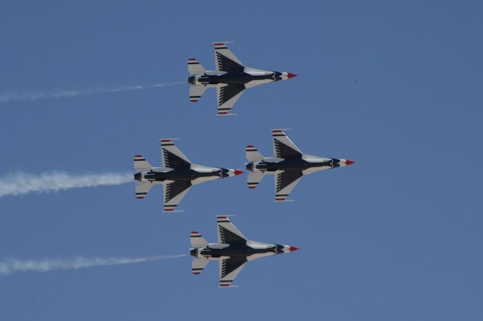 NELLIS AIR FORCE BASE, Nev. -- The U.S. Air Force Air Demonstration Squadron “Thunderbirds” fly during their acceptance show here March 11. The Thunderbirds are scheduled to fly 73 shows throughout the U.S. and Canada this year, and will be on the road approximately 250 days from March to November.  Their season ends with their homecoming show at the Nellis Open House in November. (U.S. Air Force photo/Master Sgt. John Asselin)
