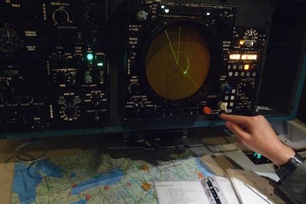 A 562nd Flying Training Squadron combat systems officer student adjusts his radar settings prior to a systems navigation familiarization flight. (U.S. Air Force photo/Steve Thurow)