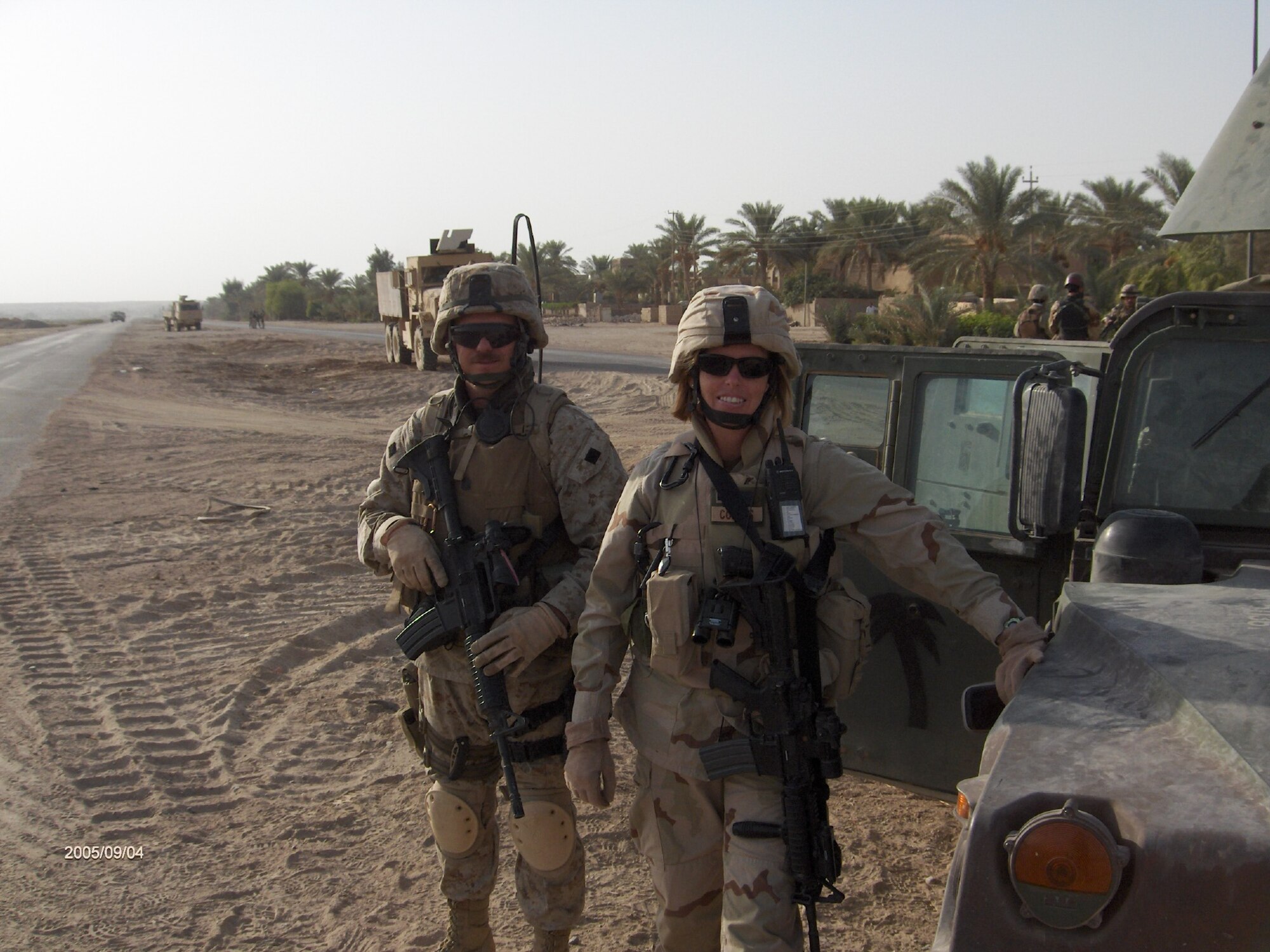 FILE PHOTO - Captain Arkan (right) with a team member in Iraq, 2005