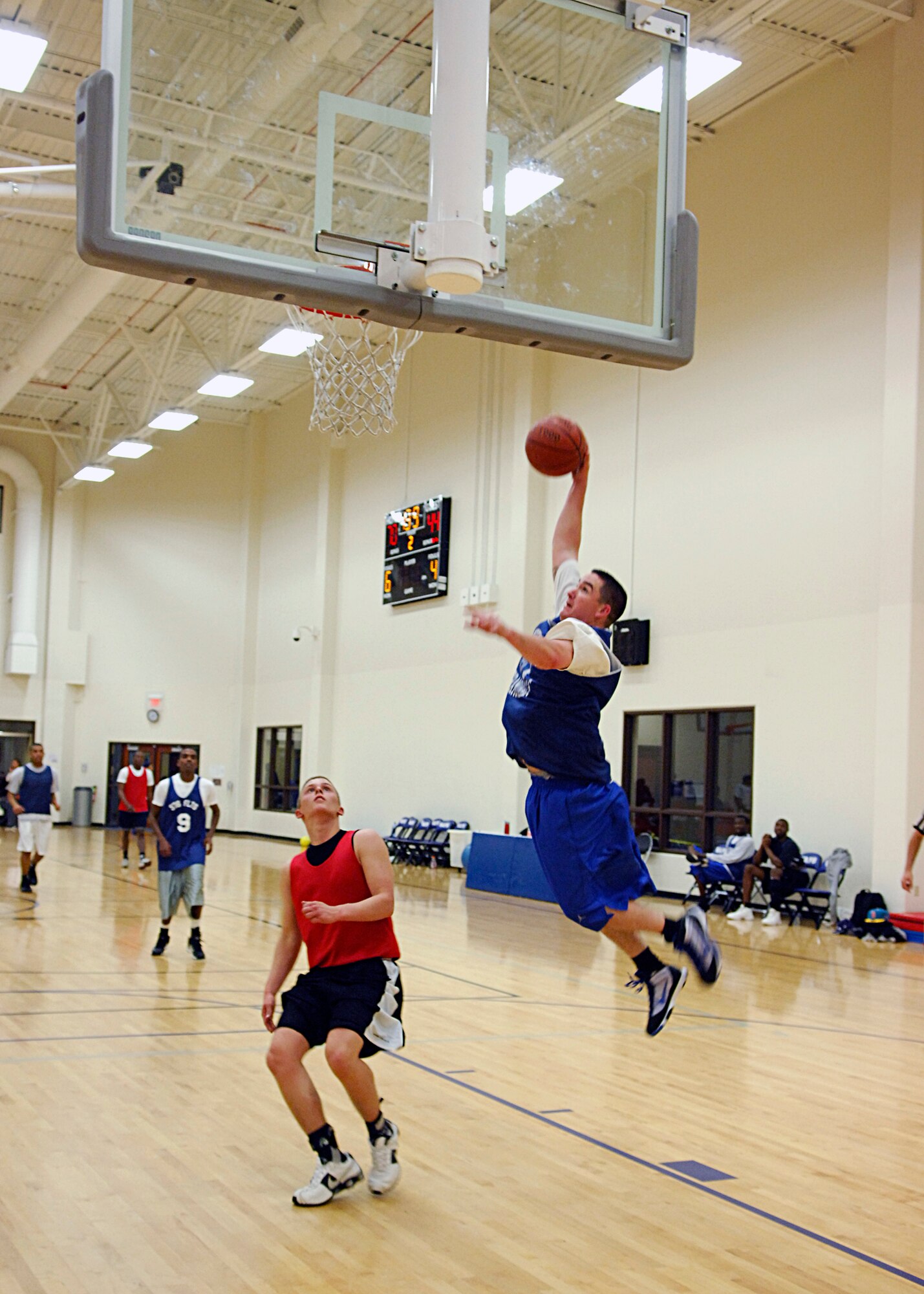 VANDENBERG AIR FORCE BASE, Calif. -- After beating his opponents down the court, Richard Chavez, of the 30th Launch Group, attempts to dunk the ball here Monday, March 8, 2010. The 30th LCG defeated the 381st Training Group 72-44.  (U.S. Air Force photo/Airman 1st Class Heather R. Shaw)














