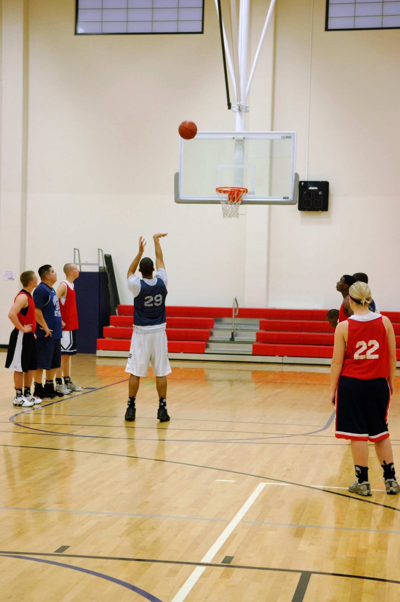 VANDENBERG AIR FORCE BASE, Calif. -- After being fouled, 30th Launch Group team member, Shaun Cain shoots two free throws here Monday, March 8, 2010. The 30th LCG won the game, defeating the 381st Training Group 72-44. (U.S. Air Force photo/Airman 1st Class Heather R. Shaw)









