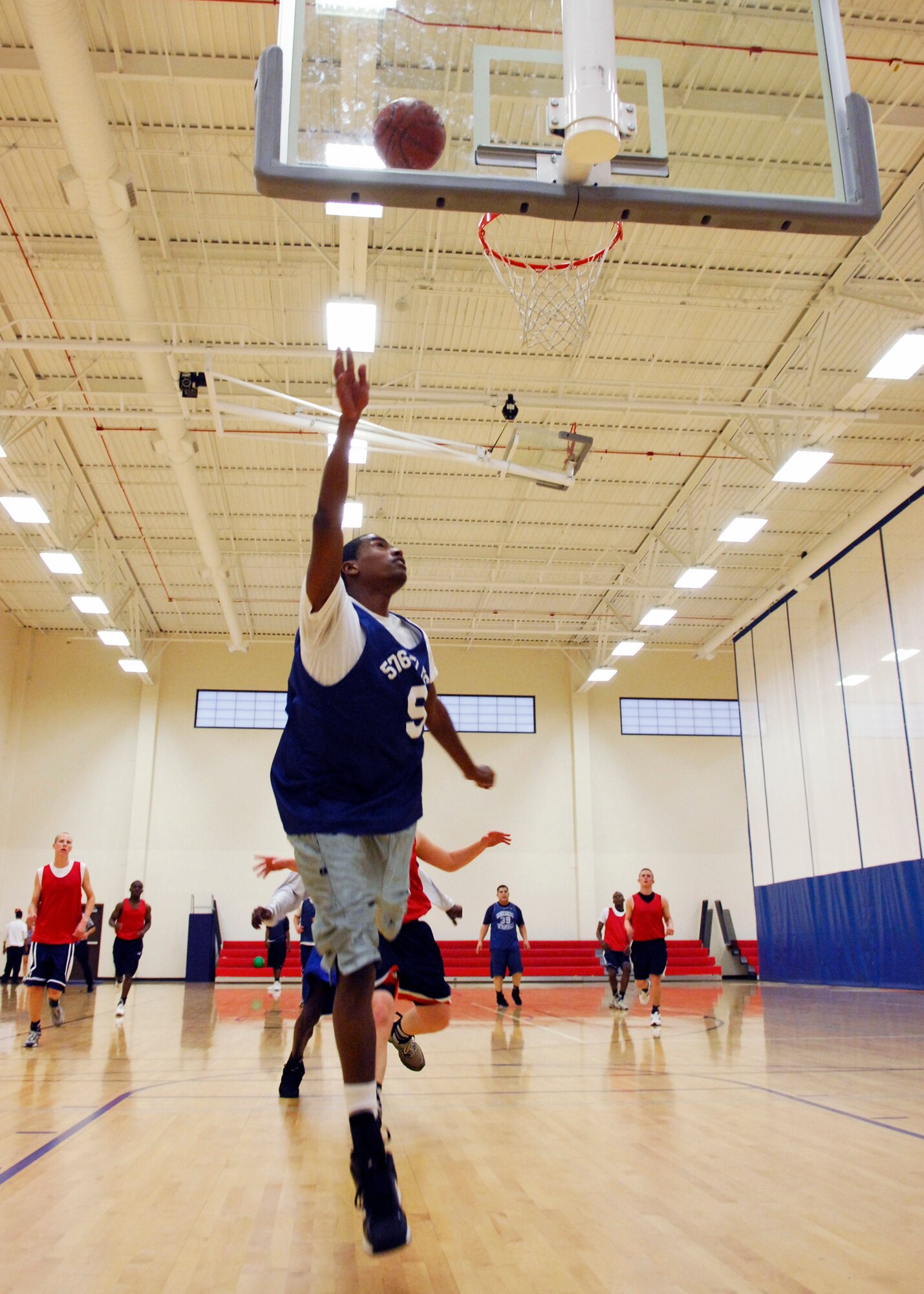 VANDENBERG AIR FORCE BASE, Calif. -- Selam Kidane, of the 30th Launch Group team, shoots a layup after beating all of his opponents down the court. The Launch Group won the game 72-44. (U.S. Air Force photo/Airman 1st Class Heather R. Shaw)


