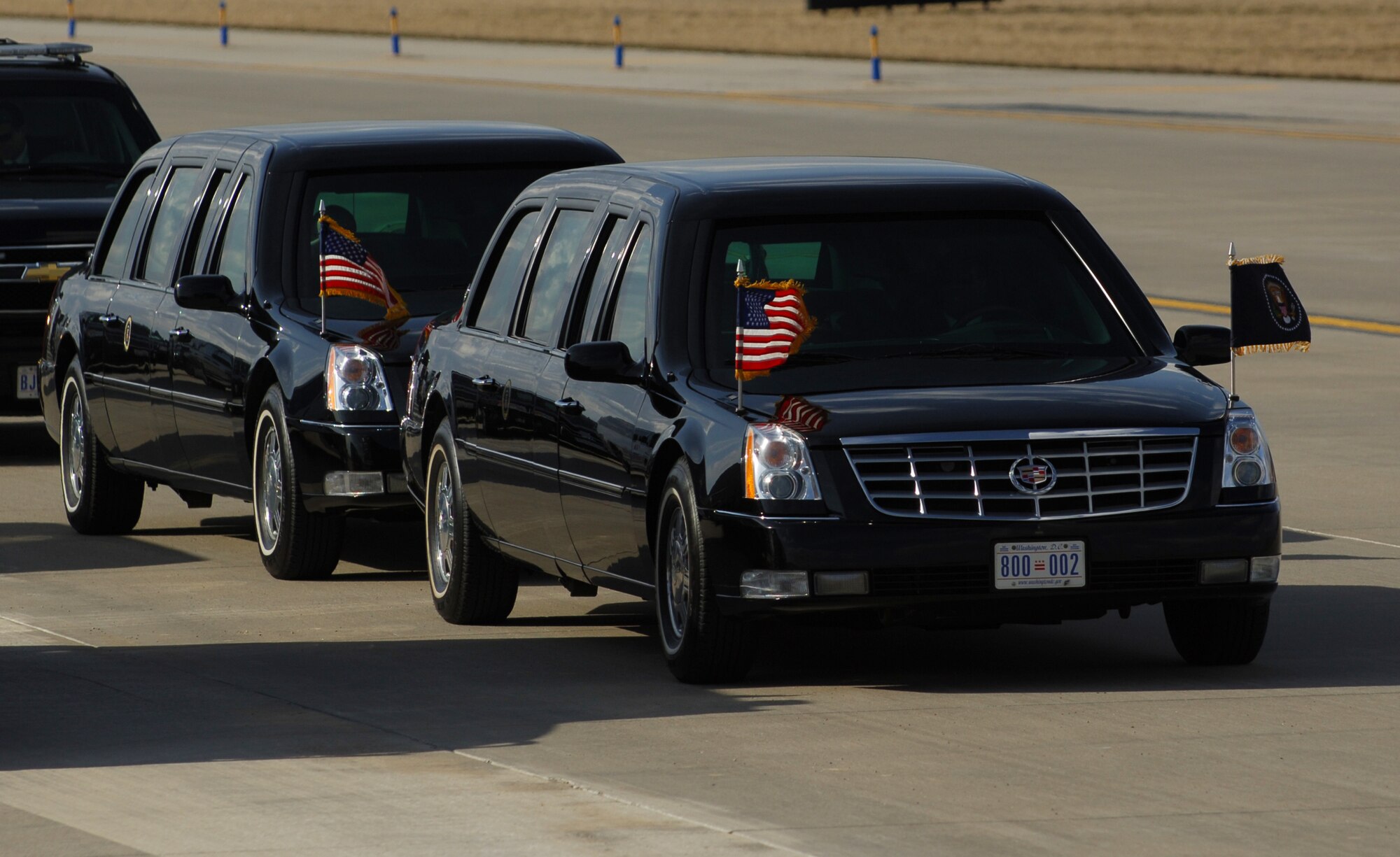 SCOTT AIR FORCE BASE, Ill. -- A motorcade of limos and police cars line up in preparation for the arrival of President Barack Obama March 10, 2010 at St. Louis - Lambert International Airport. Airmen from the 375th Logistics Readiness Squadron and the 932nd Maintenance Squadron provided refueling and vehicle maintenance support to Air Force One for the president’s visit to St. Louis.  (U.S. Air Force photo by Senior Airman Ryan Crane)