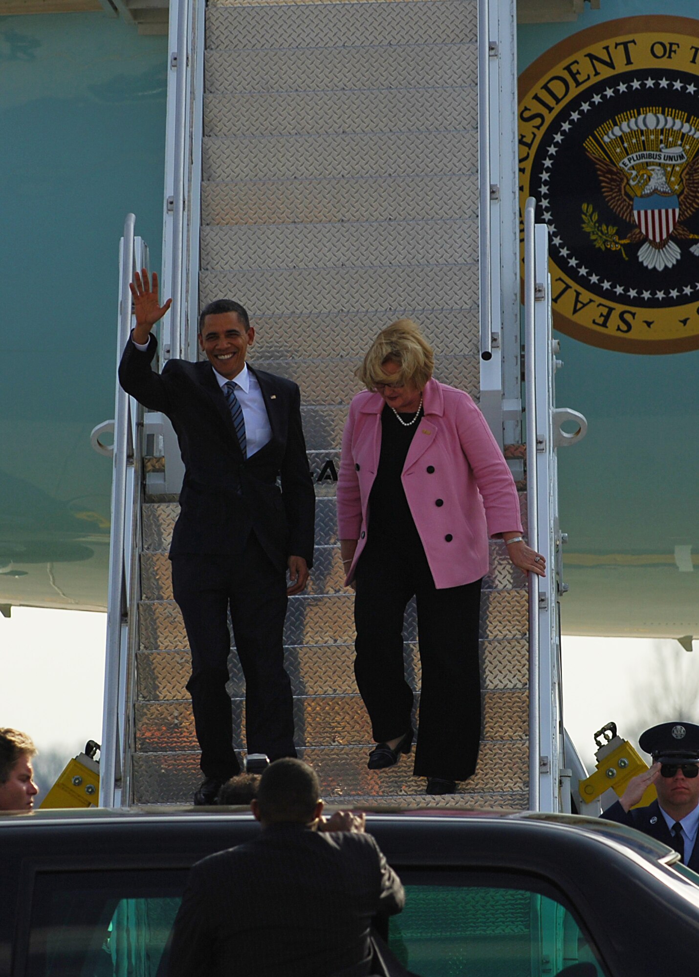 SCOTT AIR FORCE BASE, Ill. -- President Barack Obama and Senator Claire McCaskill greet the crowd as they exit Air Force One March 10, 2010 at St. Louis - Lambert International Airport. Airmen from the 375th Logistics Readiness Squadron and the 932nd Maintenance Squadron provided refueling and vehicle maintenance support to Air Force One for the president’s visit to St. Louis.  (U.S. Air Force photo by Senior Airman Ryan Crane)