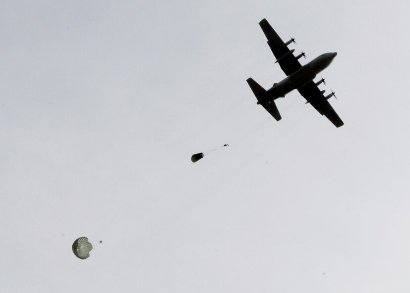 Soliders from the U.S. Army Civil Affairs  and Psychological Operations Command (Airborne) jump from an Air Force C-130 Hercules here March 5. The jump was done as part of training required every 90 days. (Air Force photo/Senior Airman William A. O'Brien)