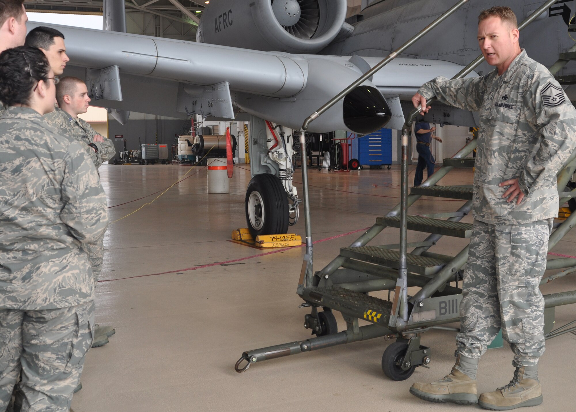 Senior Master Sgt. Kyle K. Graff, an overhaul supervisor for the 71th Aircraft Maintenance Squadron on Barksdale Air Force Base, La., briefs the capabilities and particulars of an A-10 Thunderbolt II in order to educate a group of Reserve Officer Training Corps students from the University of Memphis during a tour of Barksdale March 9, 2010. The 2nd Bomb Wing on Barksdale facilitated the tour for the university with support from the 917th Wing.  (U.S. Air Force Photo/Senior Airman Crystal Marie Jordan)