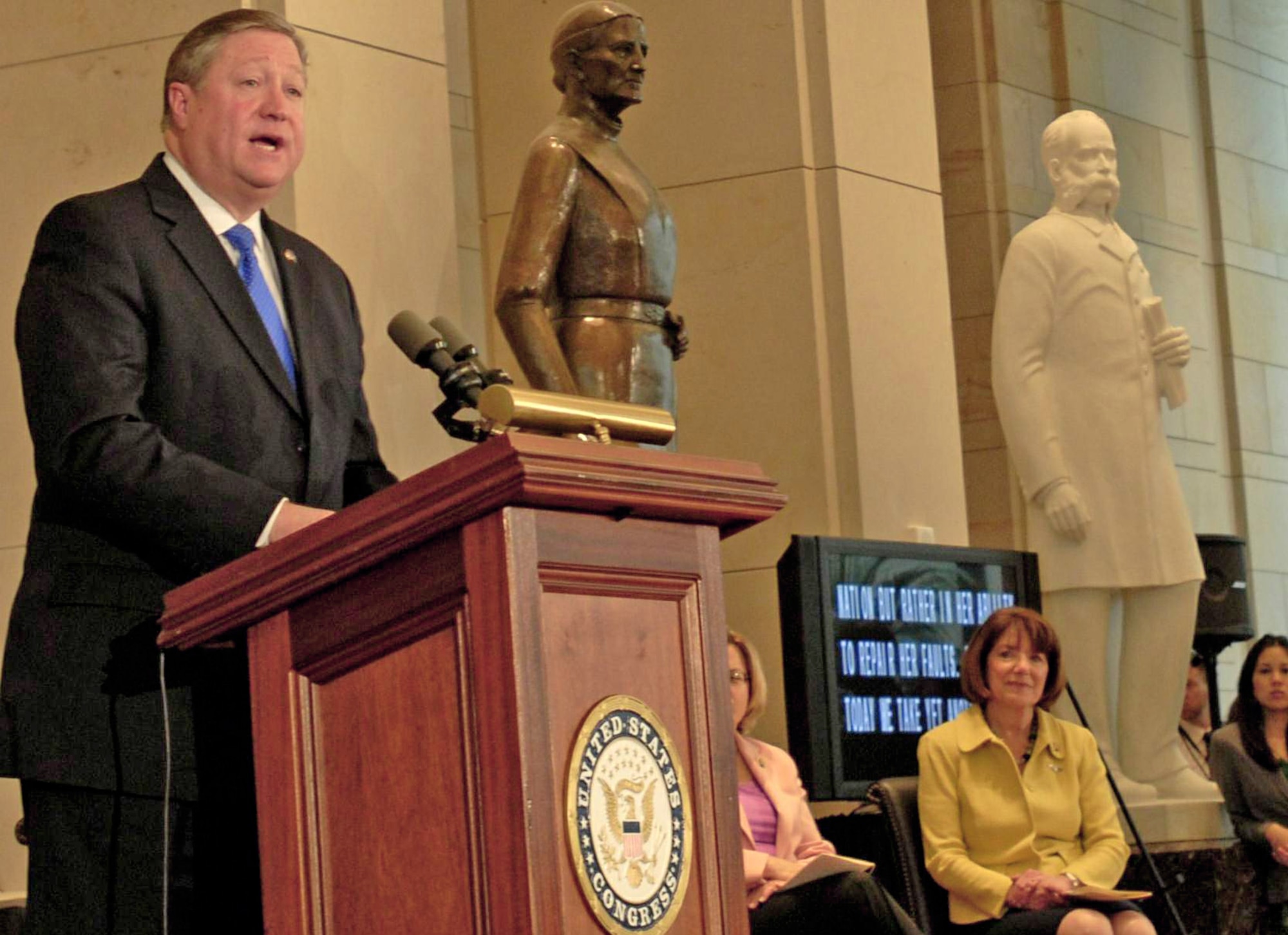 Secretary of the Air Force Michael Donley speaks during a ceremony to award World War II Women Airforce Service Pilots the Congressional Gold Medal at the Capitol March 10, 2010. More than 200 WASPs attended the event, many of them wearing their World War II-era uniforms. The audience, which Speaker Nancy Pelosi noted was one of the largest ever in the Capitol and too large to fit into Emancipation Hall, also included their families, as well as the families of those who have since died or couldn't travel. (U.S. Air Force photo/Staff Sgt. J.G. Buzanowski)