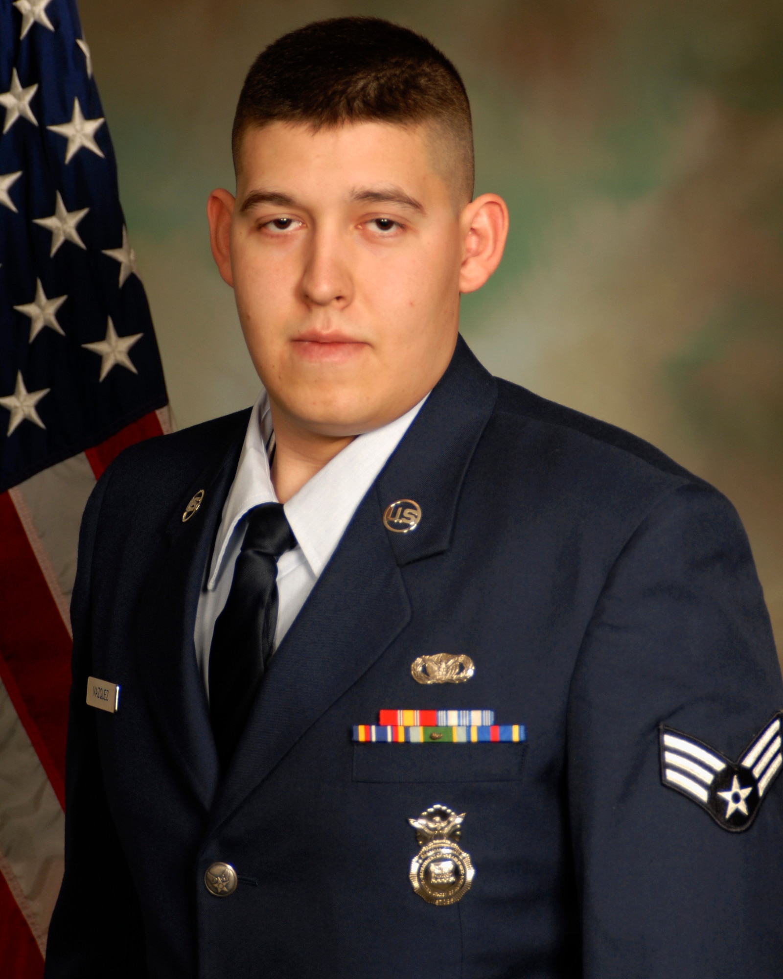 Senior Airman Edward J. Vazquez, a member of the 175th Security Forces Squadron, was recognized as the 175th Wing's Airman of the Year for 2009 at a ceremony held at Warfield Air National Guard Base, Md., Dec. 11, 2009.  (U.S. Air Force photo by Tech. Sgt. Chris Schepers/Released.)